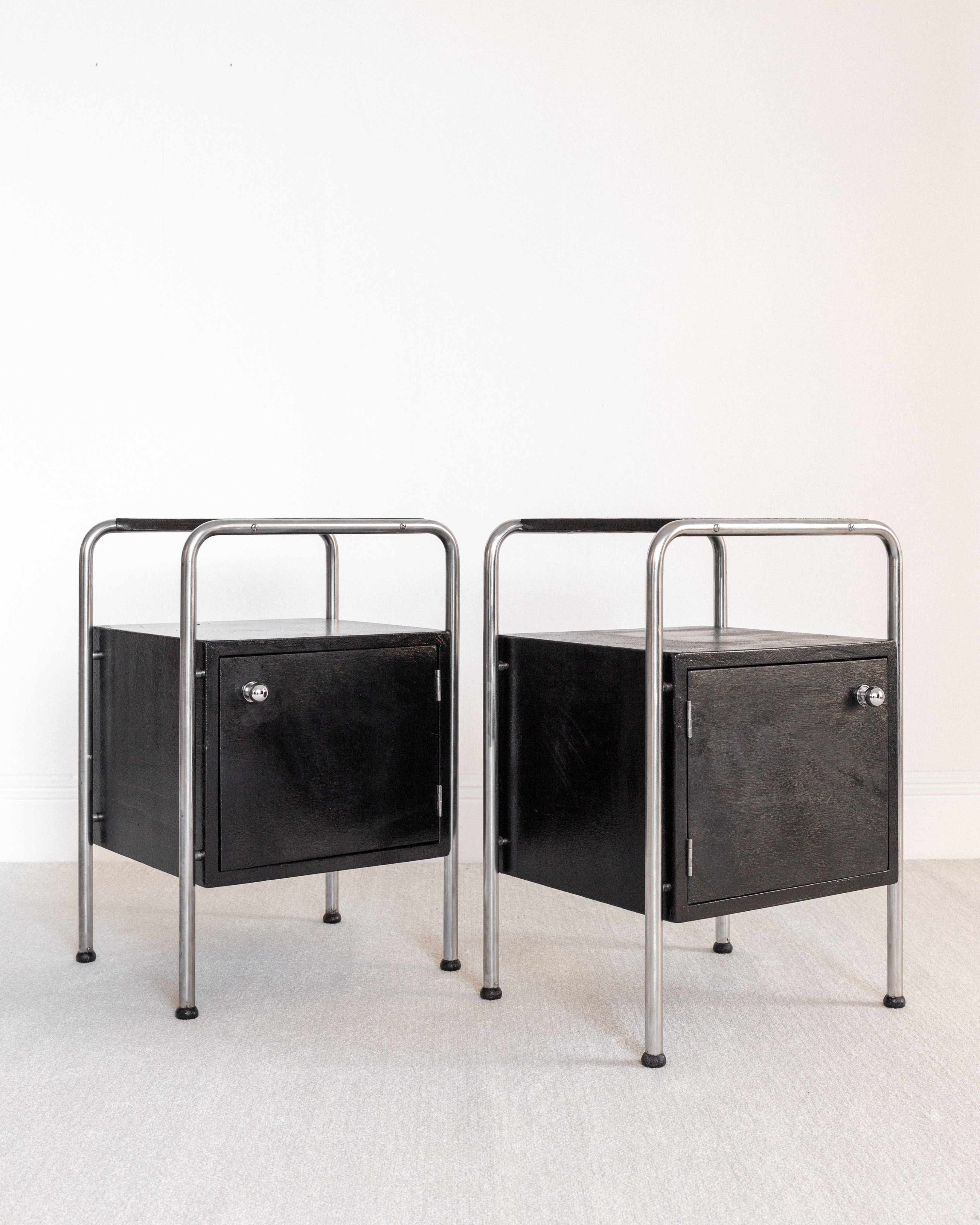 Pair of Functionalist Nightstands, Sweden 1930s — close-up of black wood and metal frame