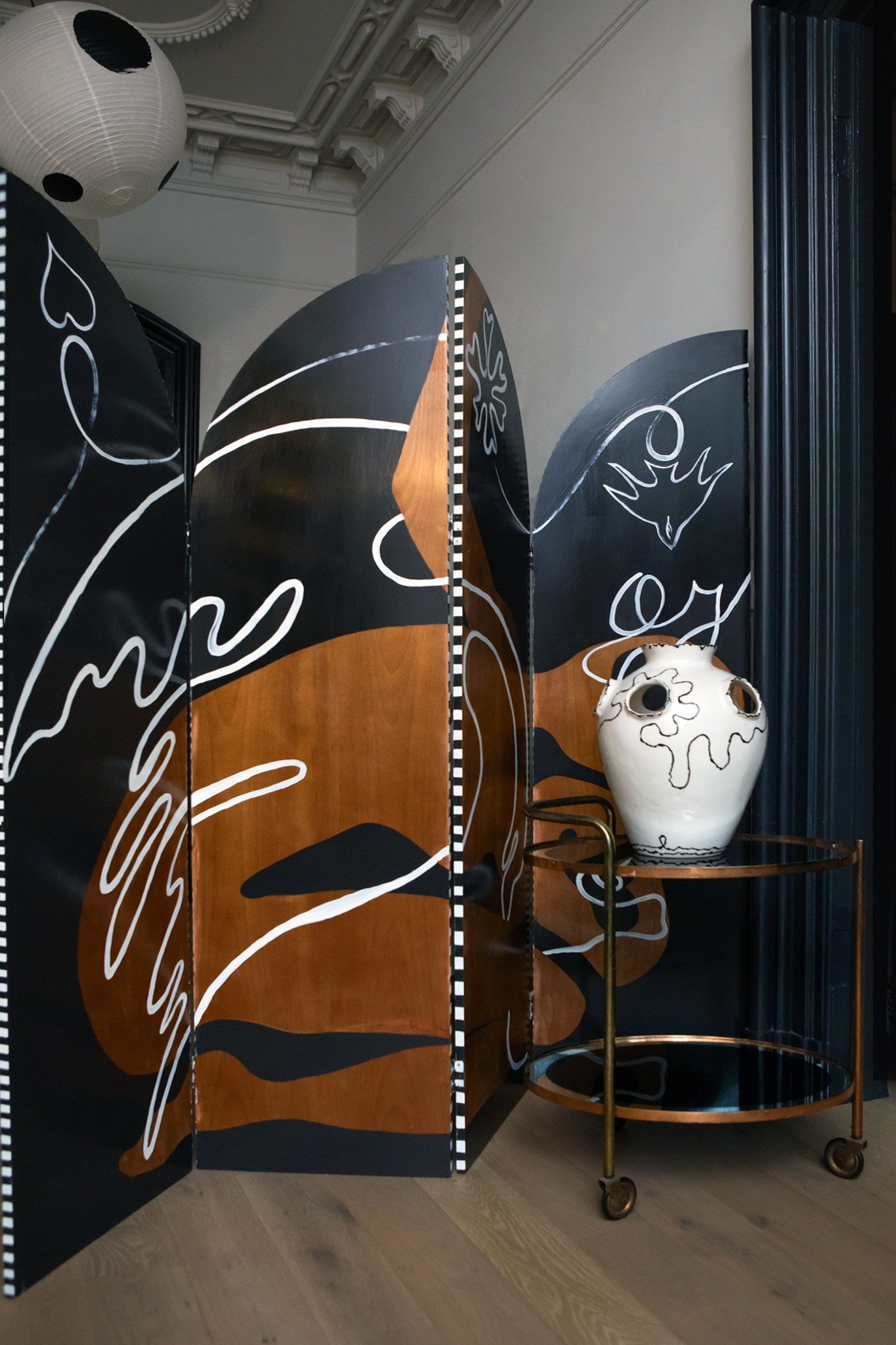 Stripe Side Screen — angled view in modern interior with decorative vase