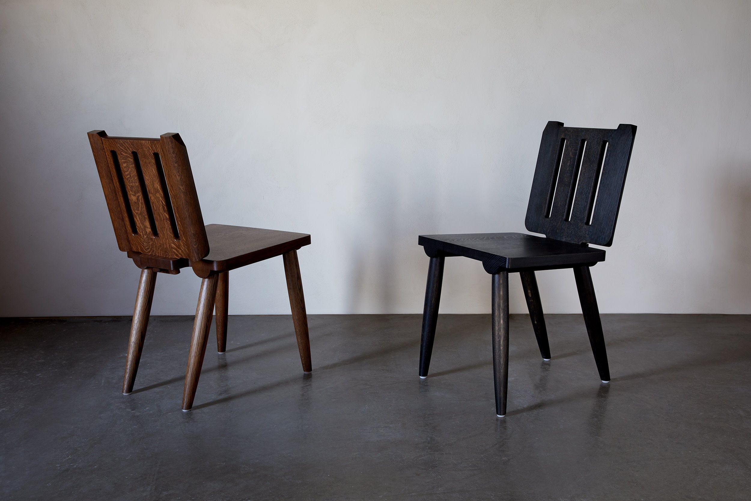 Alpine Chair — back view of wooden chair in neutral setting