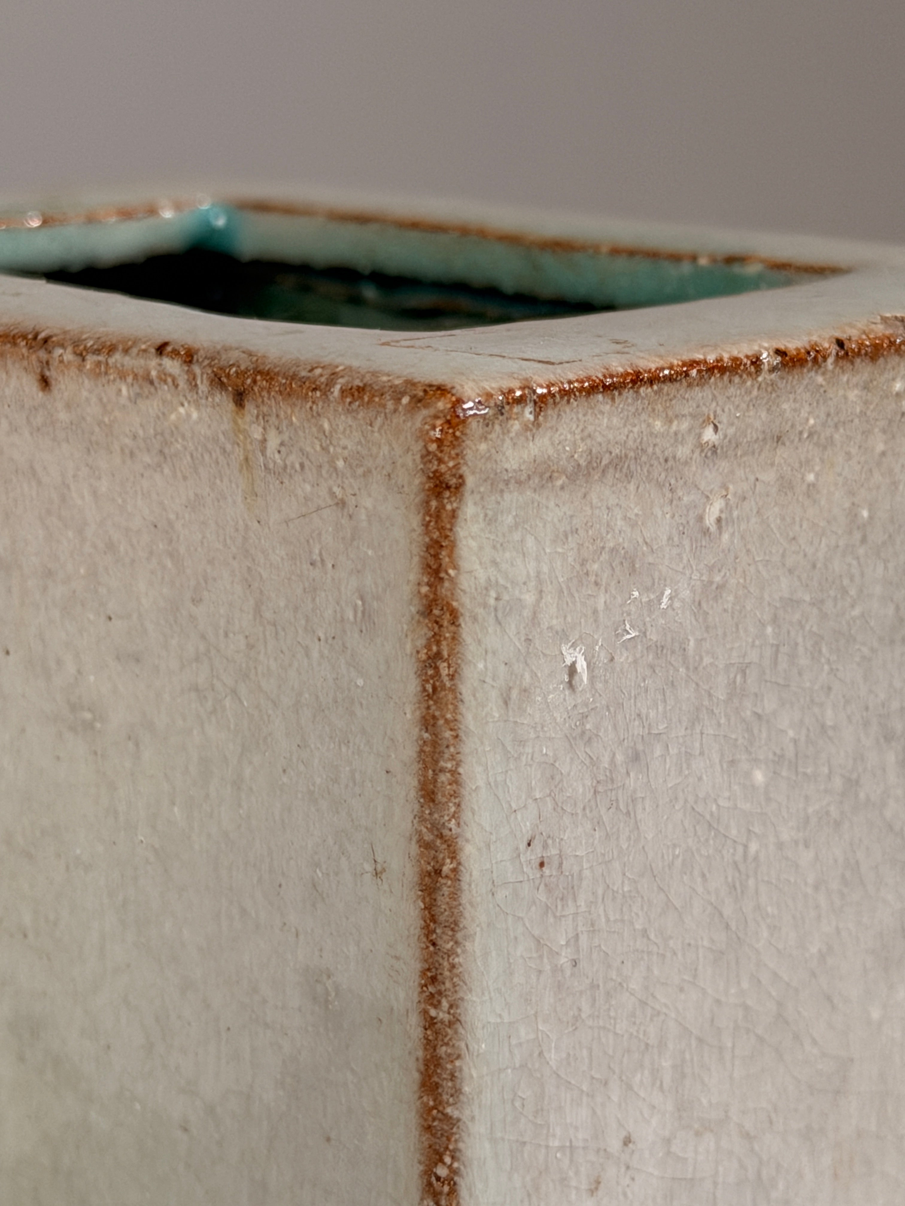 Rectangular glazed ceramic vase, circa 1960 — lifestyle setting