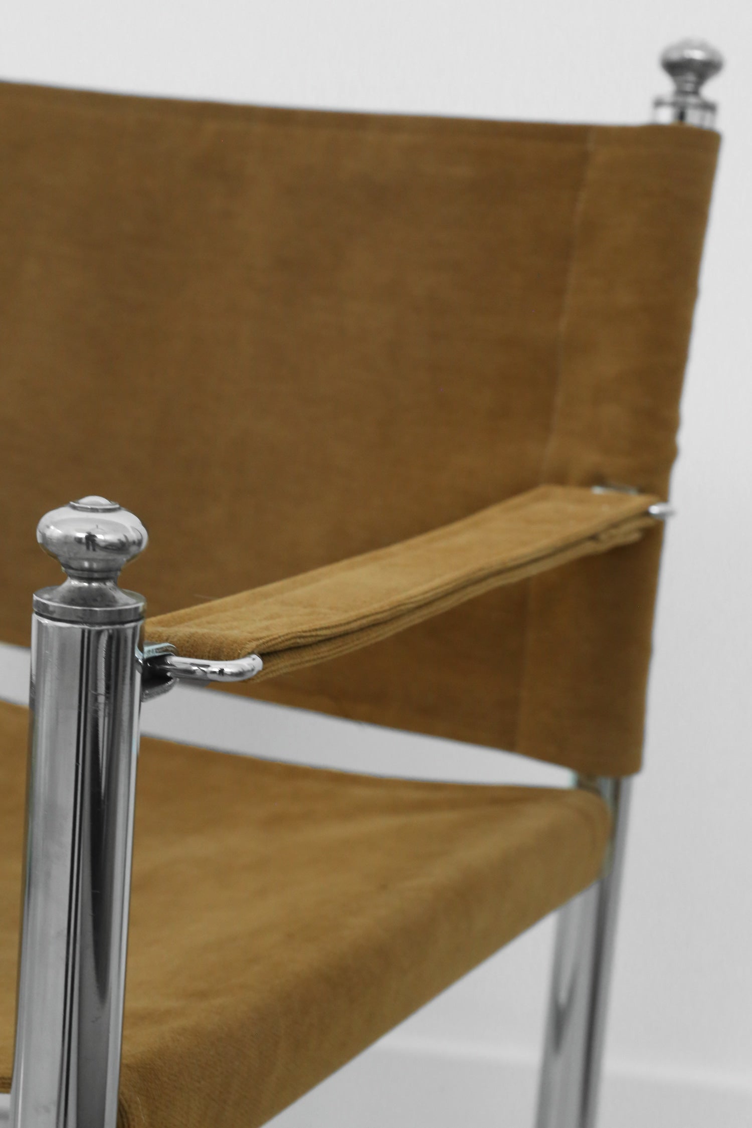 Chrome and Corduroy Arm Chair — detail view