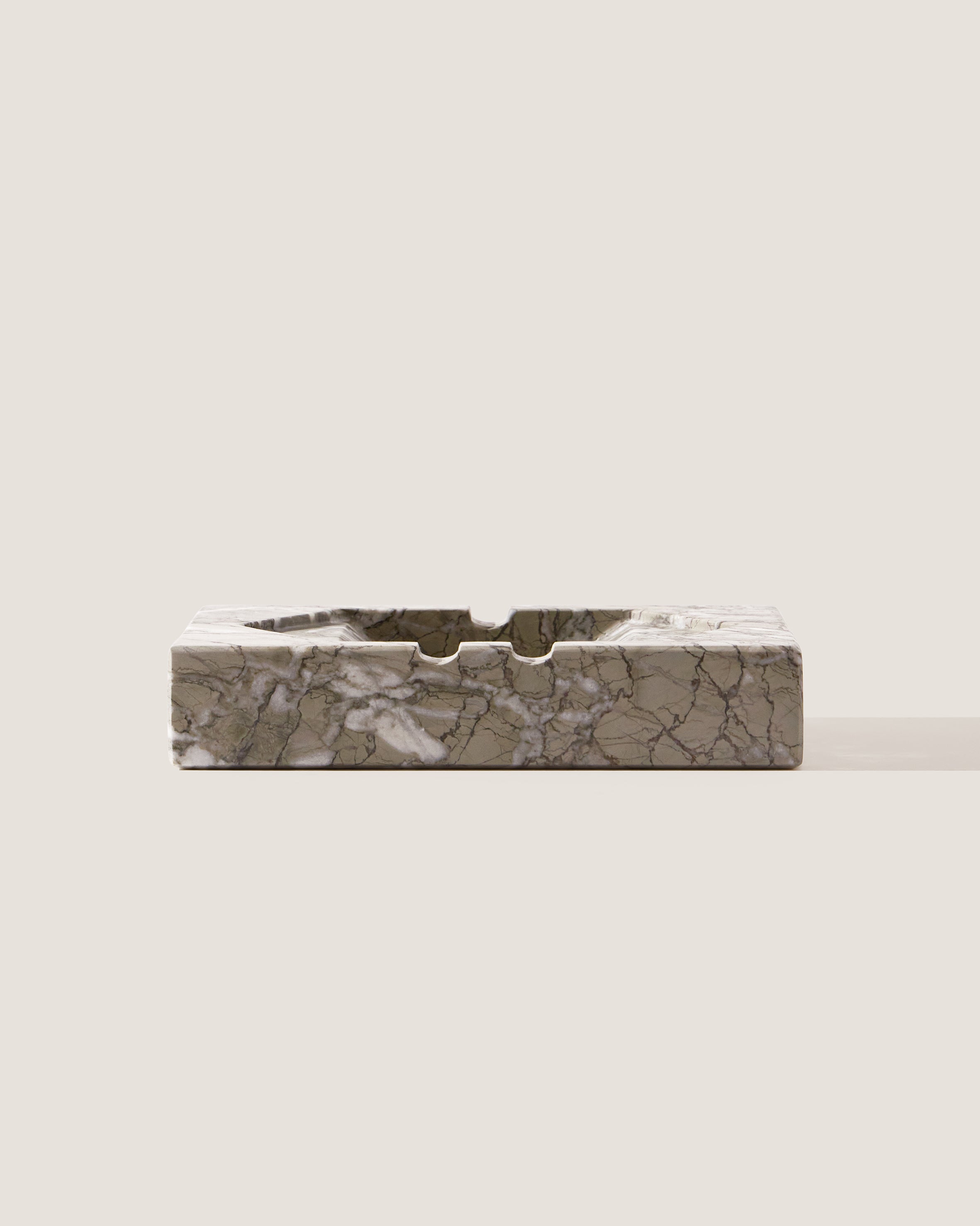Ame IV Marble Ashtray — side view highlighting marble texture