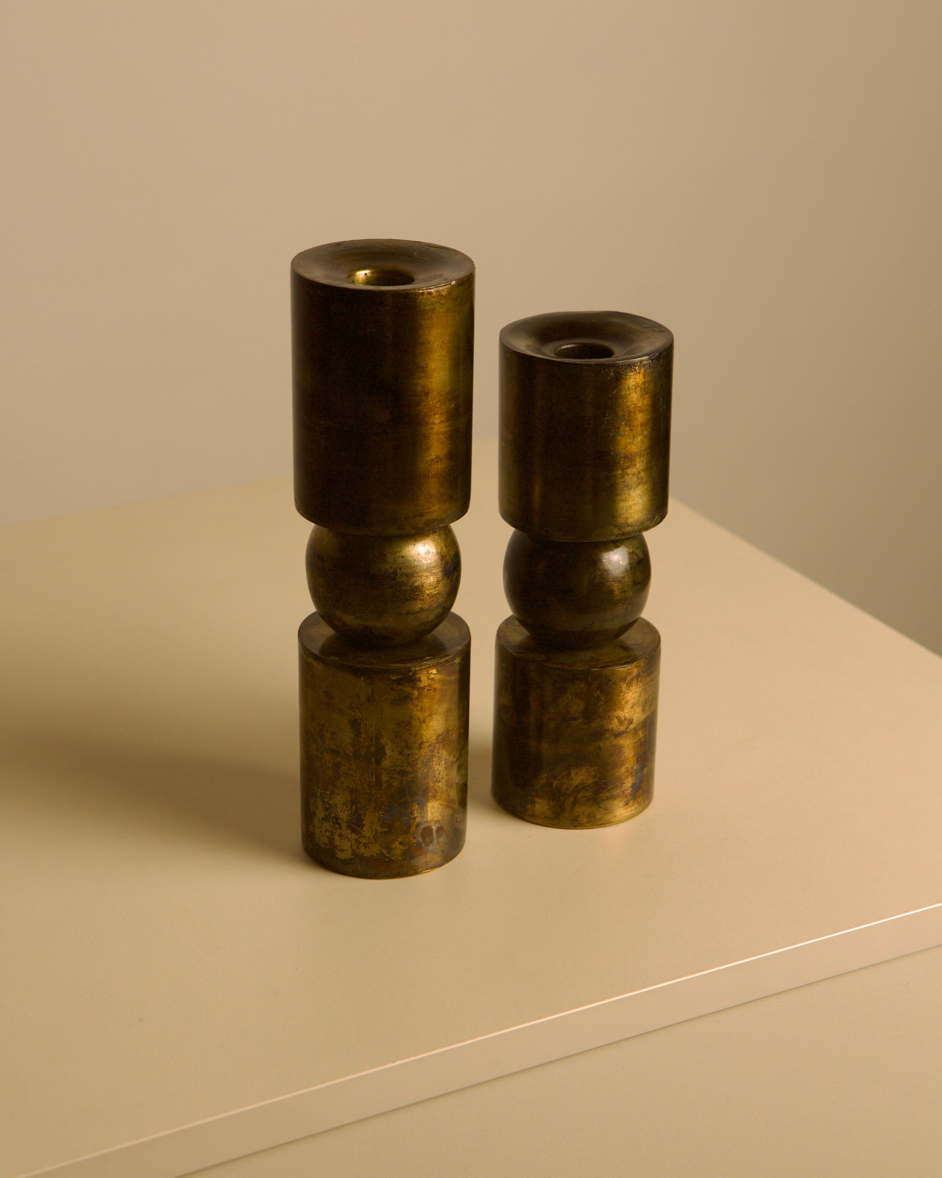 Pair of Danish copper-plated metal candlesticks from the 80s — detail view