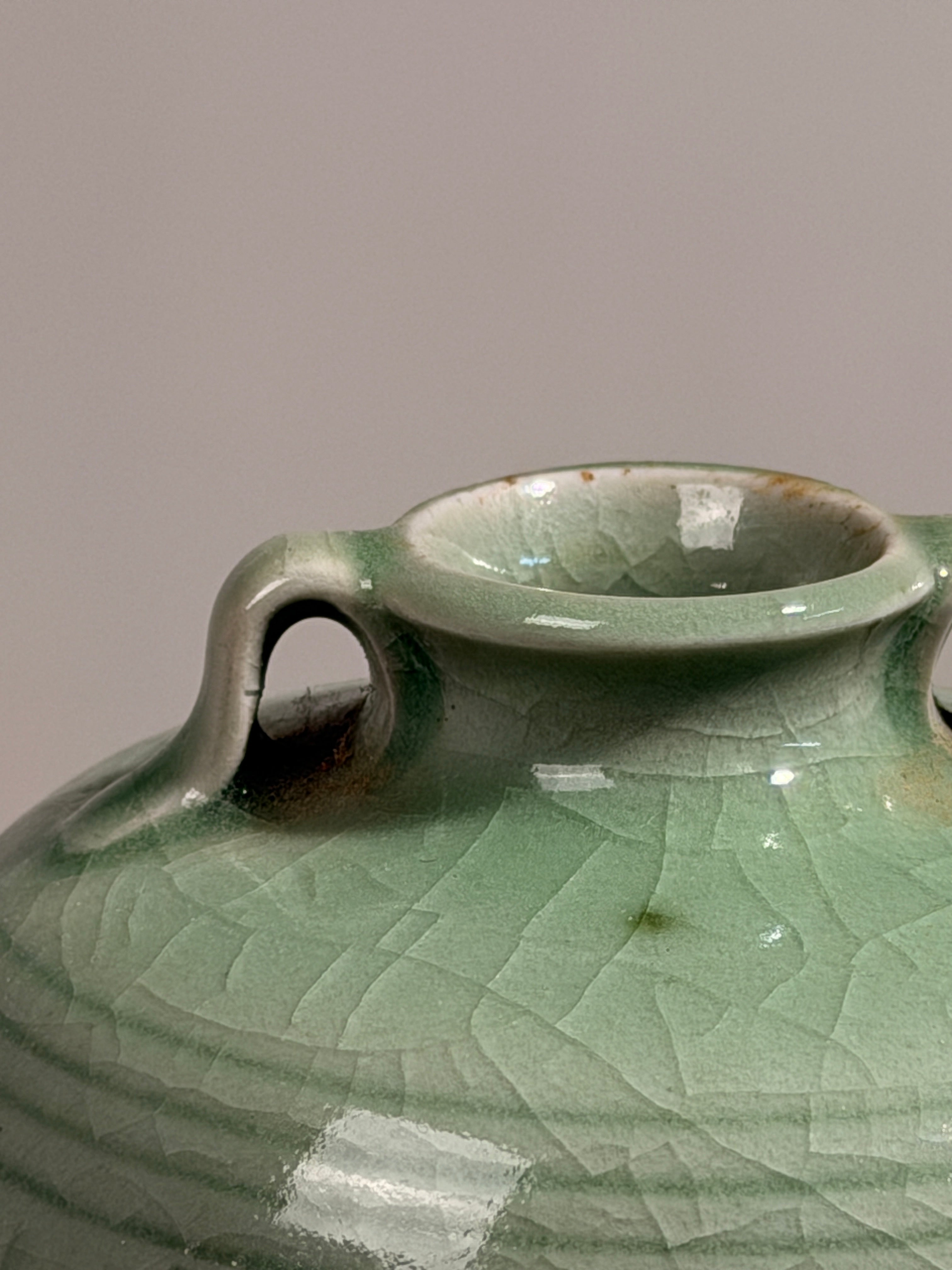 Art Deco celadon vase, France, circa 1920.  — side angle