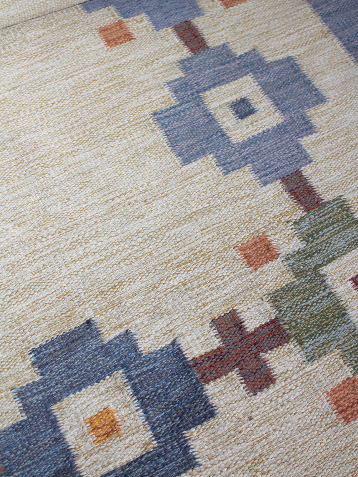 Karin Jönsson Swedish Mid-Century Geometric Wool Kilim 171x252cm — angled view highlighting colorful geometric patterns