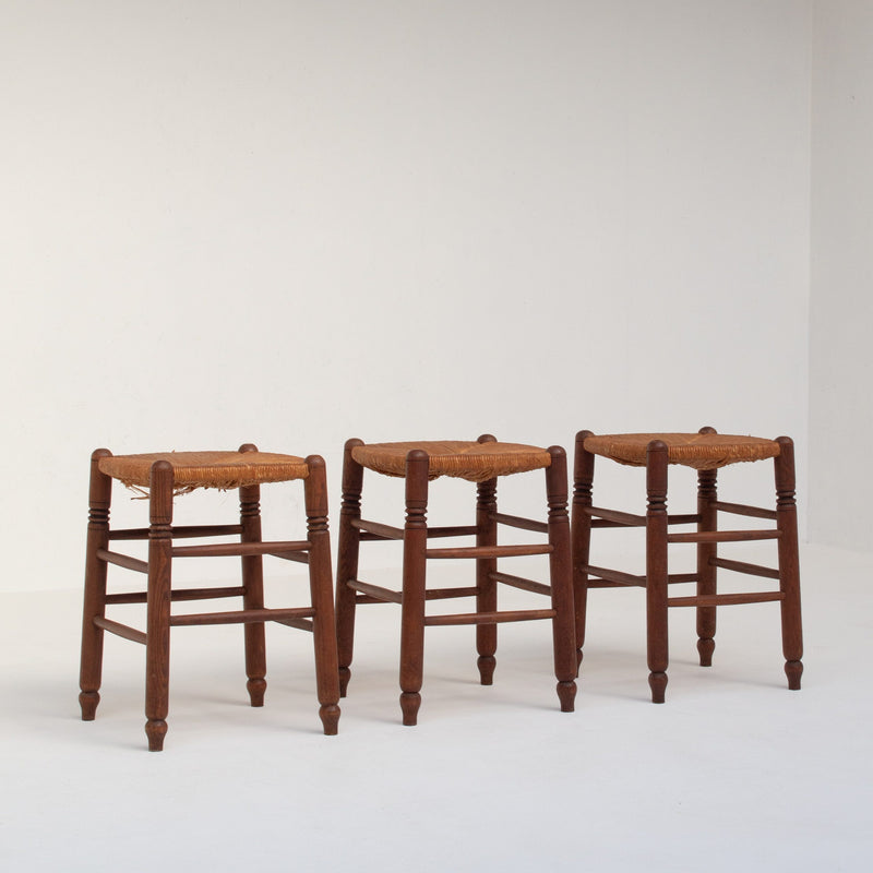 Set of 3 French Rattan Top Stools in Solid Wood — close-up of rattan seats and wooden legs