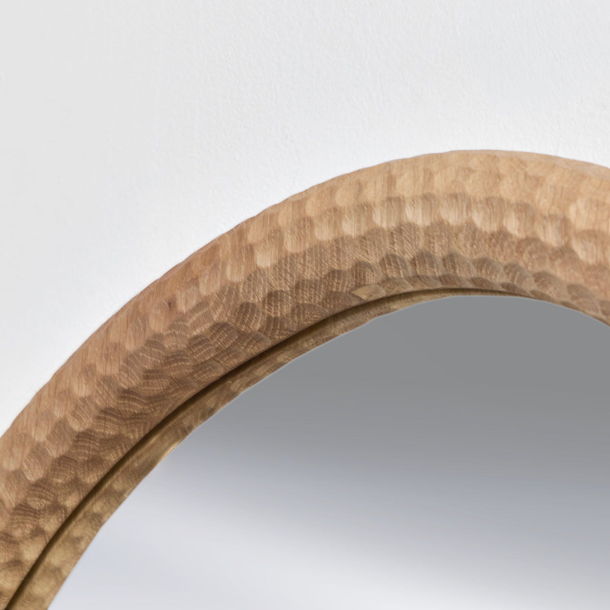 Oval Amarante gouged wood Mirror — lifestyle setting