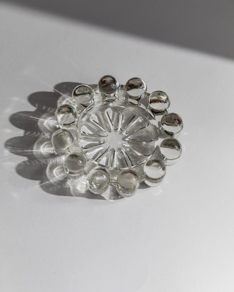 Clear glass ashtray with decorative spherical details, 1970s Italian design
