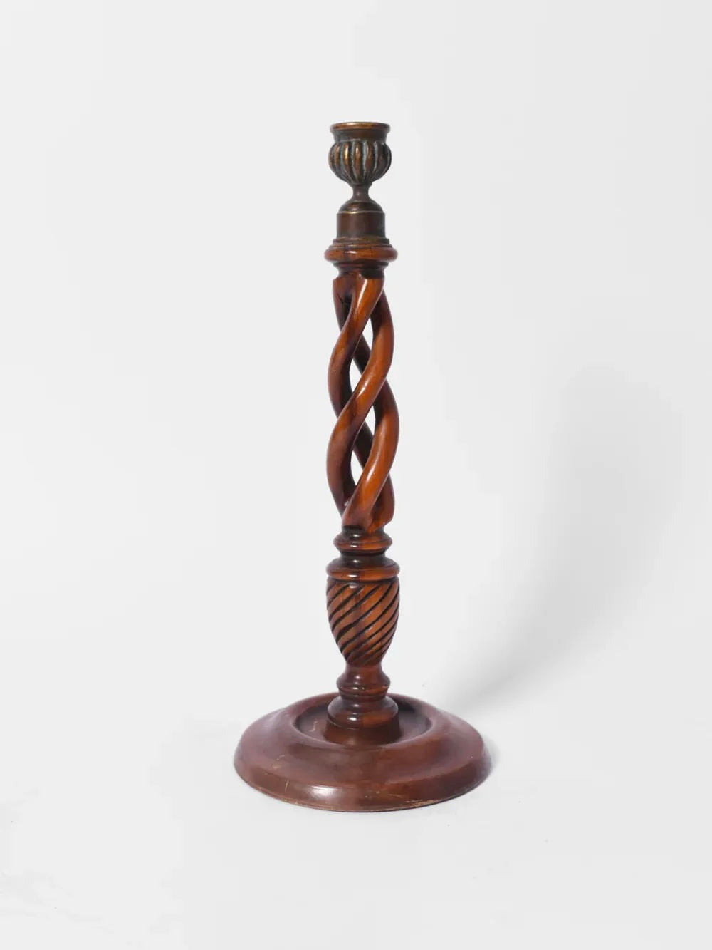 The Pair of Turned Wood Candlesticks by Barracuda Interiors features elegant 19th c. design, with round bases and twisted spiral stems, shown here against a plain white background.