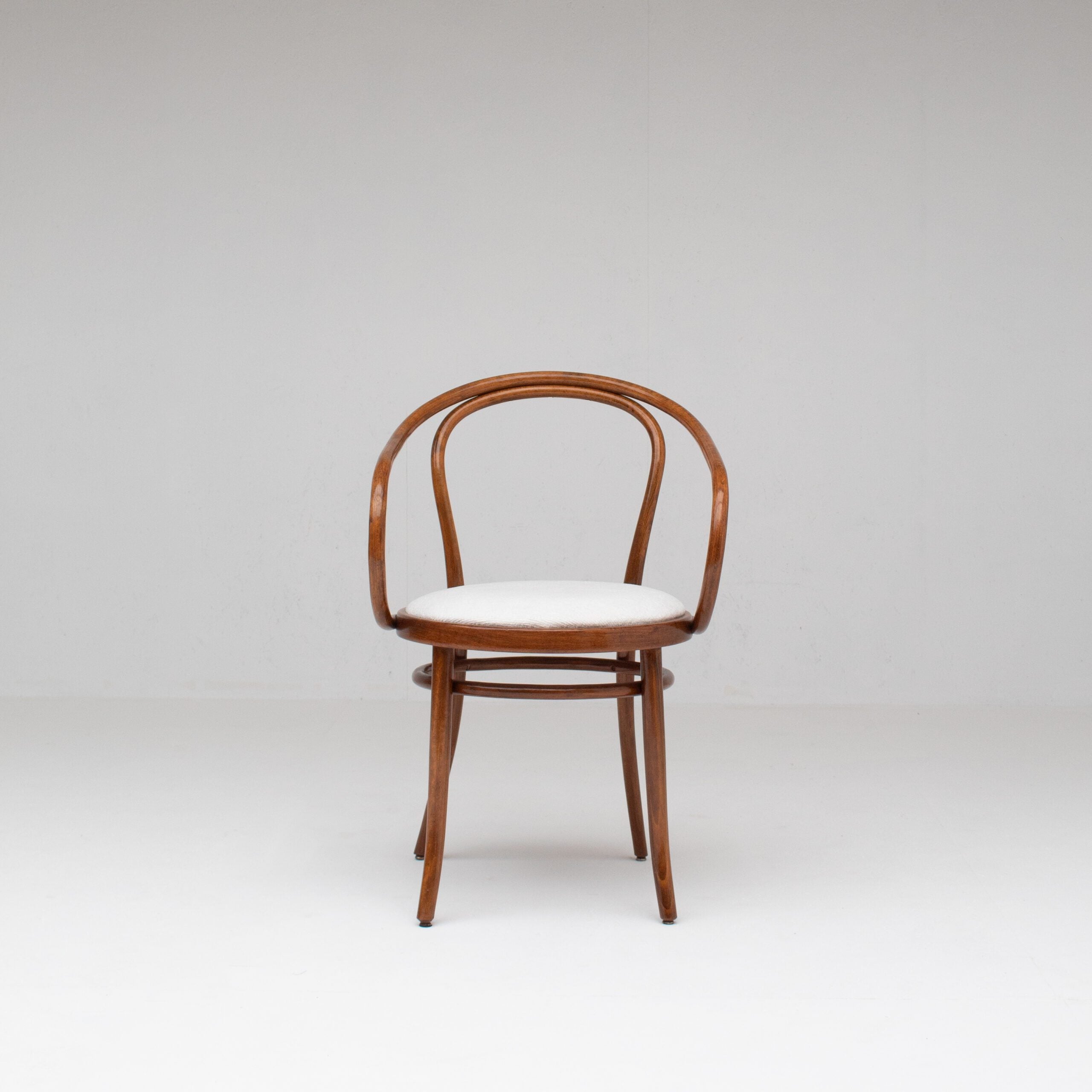 Set of Four Thonet Bentwood Armchairs in Walnut with Bouclé Upholstery — lifestyle setting