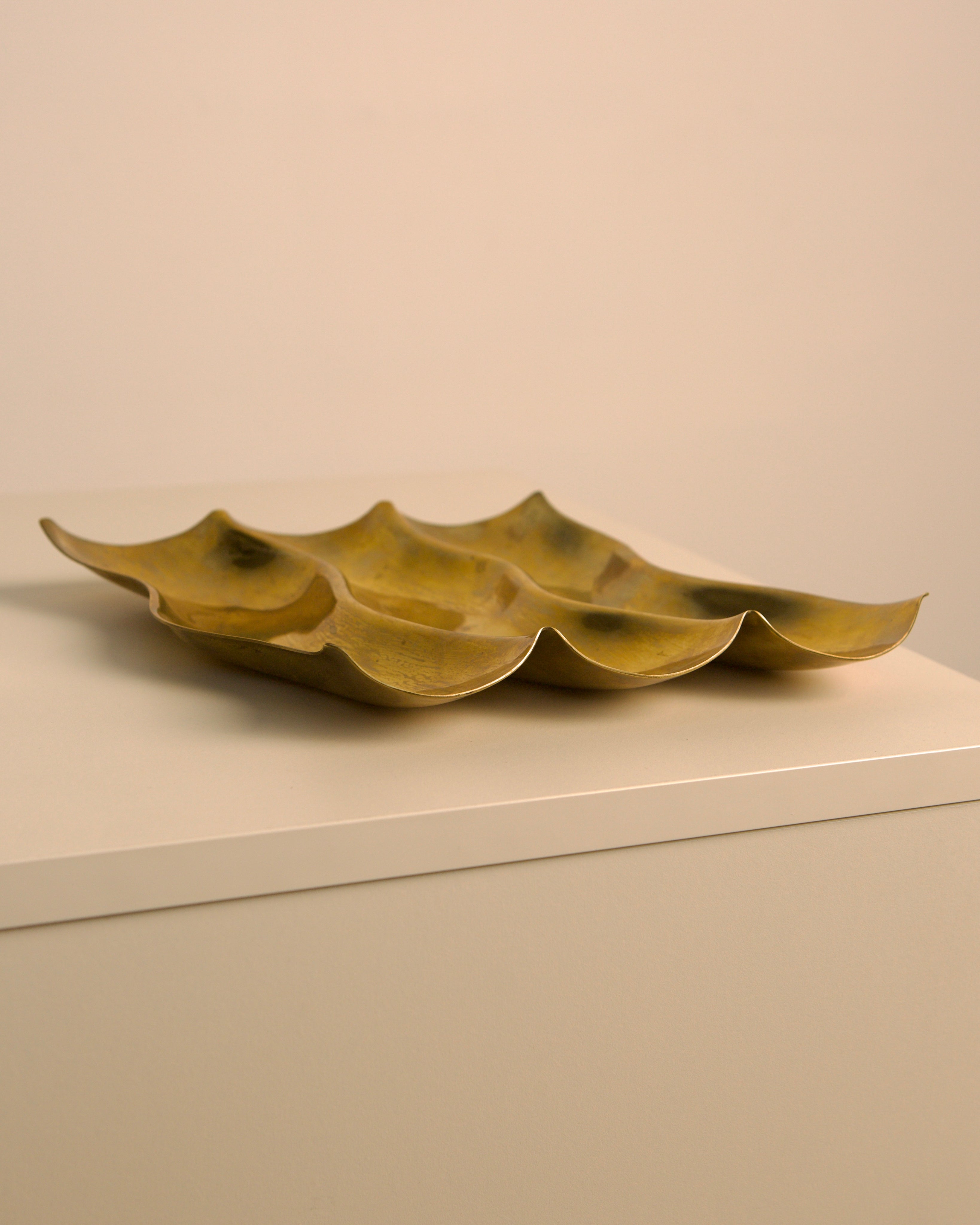 Brass Boca vide-poche by Sergio Asti showing undulating wave form