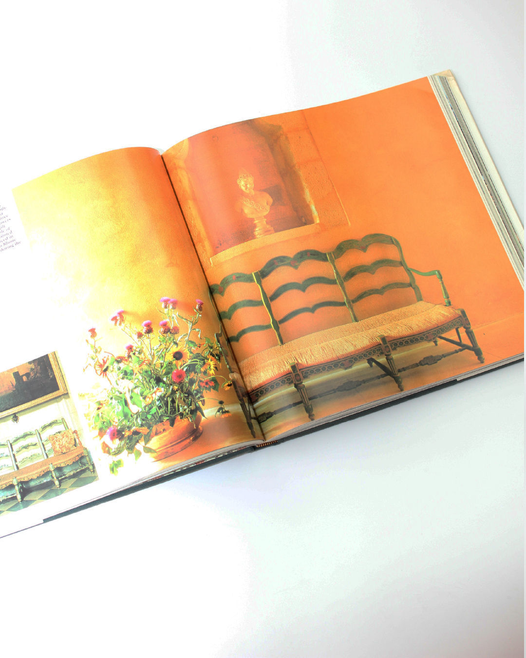 French Country Book — open view of colorful interior with sofa