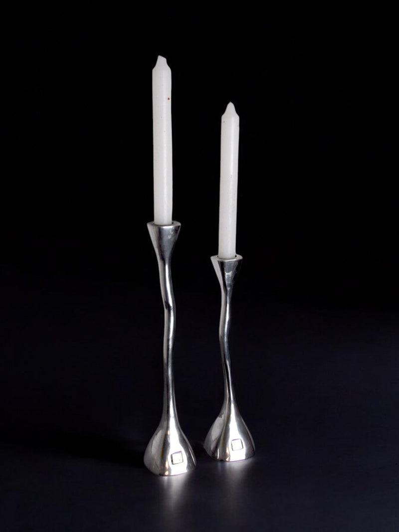 Pair of Candleholders, art3, Spain, 1970s — close-up of polished silver finish