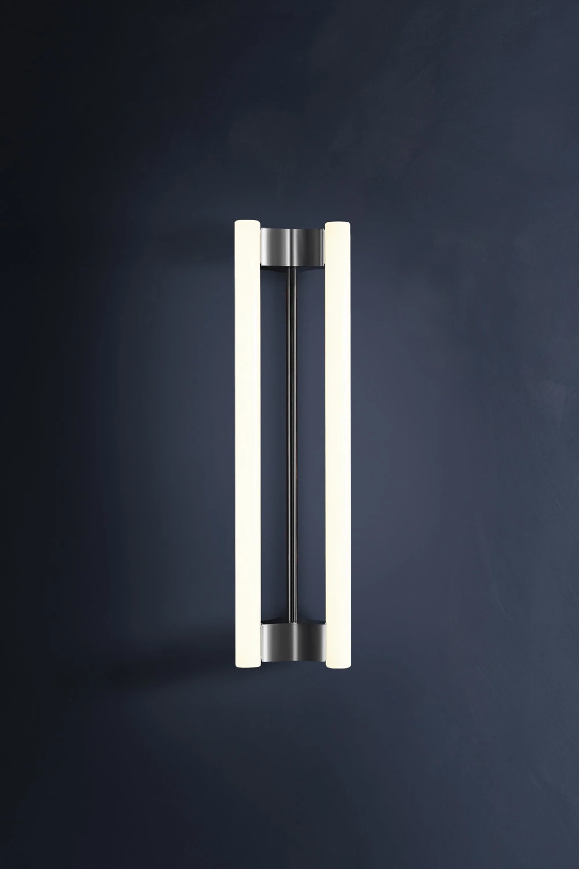 LIA WALL SCONCE 50 — top view of modern wall light in black setting