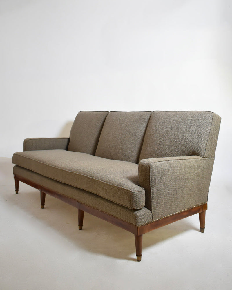 Three Seats Sofa, 1960s — angled view showing gray fabric and wooden legs