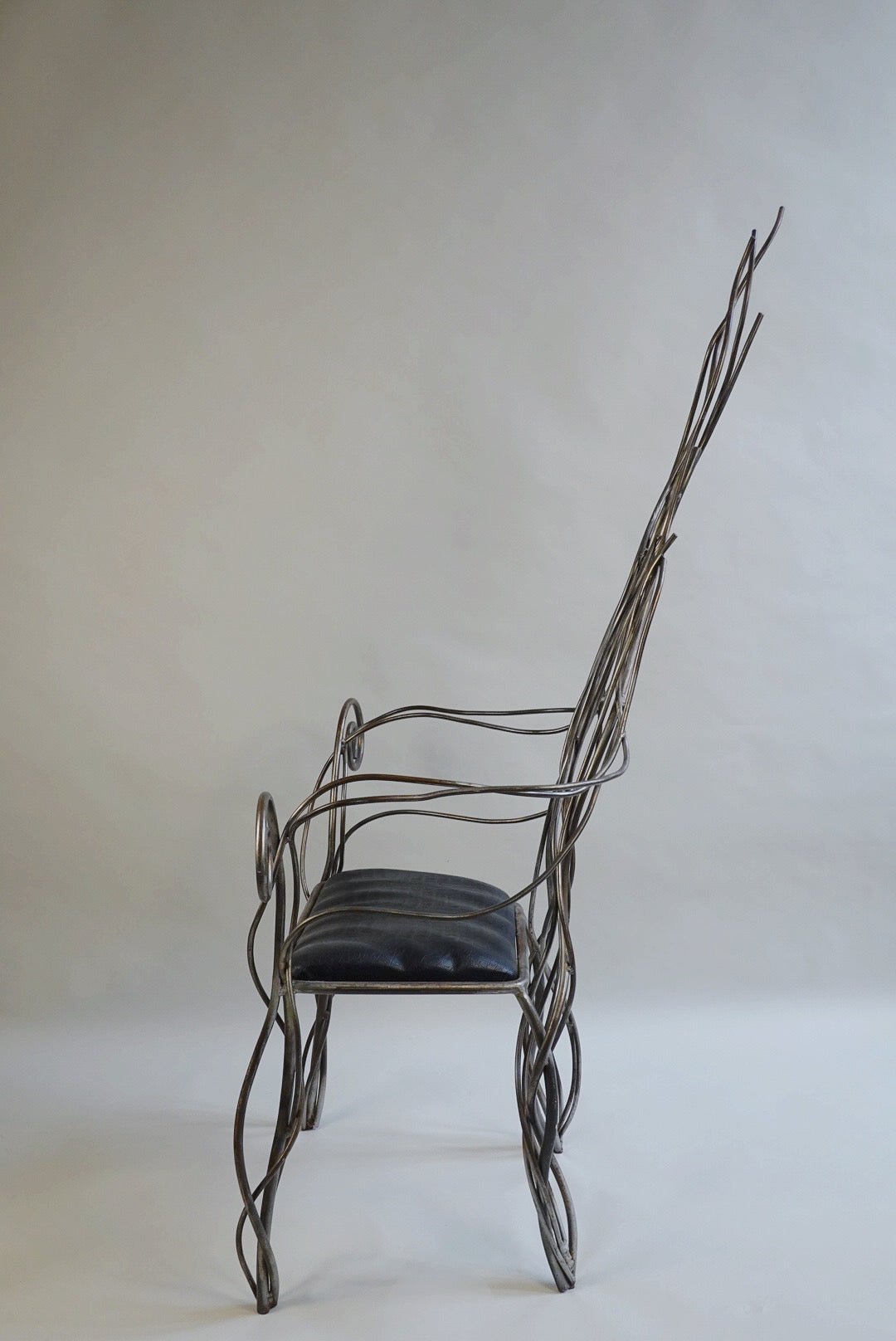 Iron High Back Chair in the manner of André Dubreuil c.1990's — in context