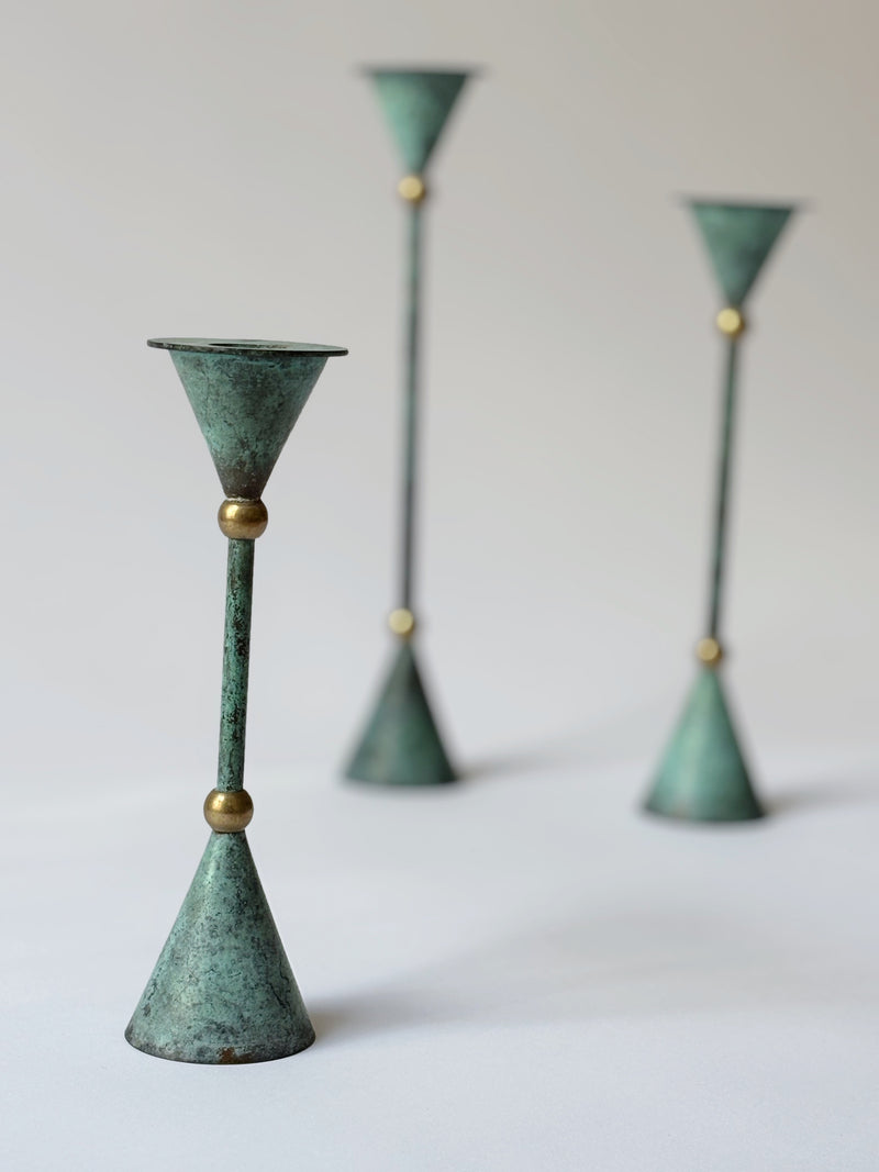 Set of 3 Postmodern Candleholders — close-up of patinated green metal finish