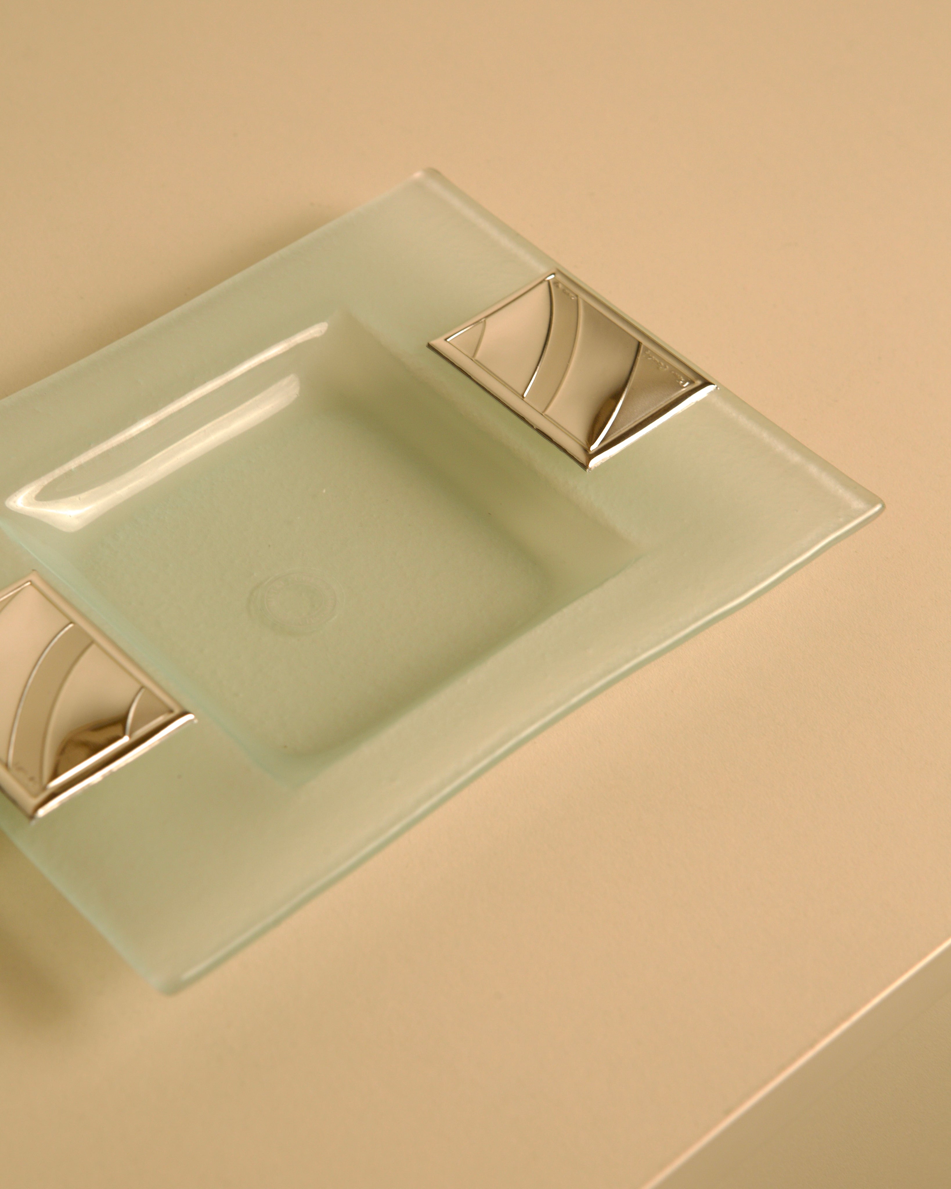 Rectangular crystal and silver-plated metal valet tray by Pierre Cardin, 1980s — angled view highlighting silver accents