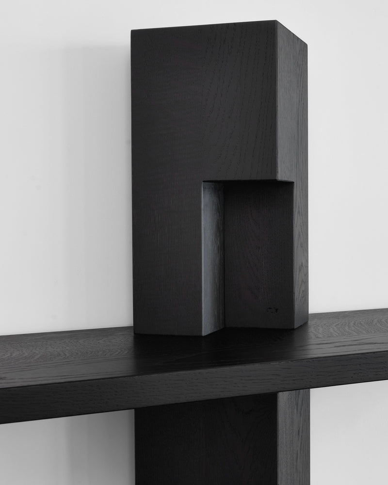 Galea Bibliothèque — close-up of black wood detail on shelf