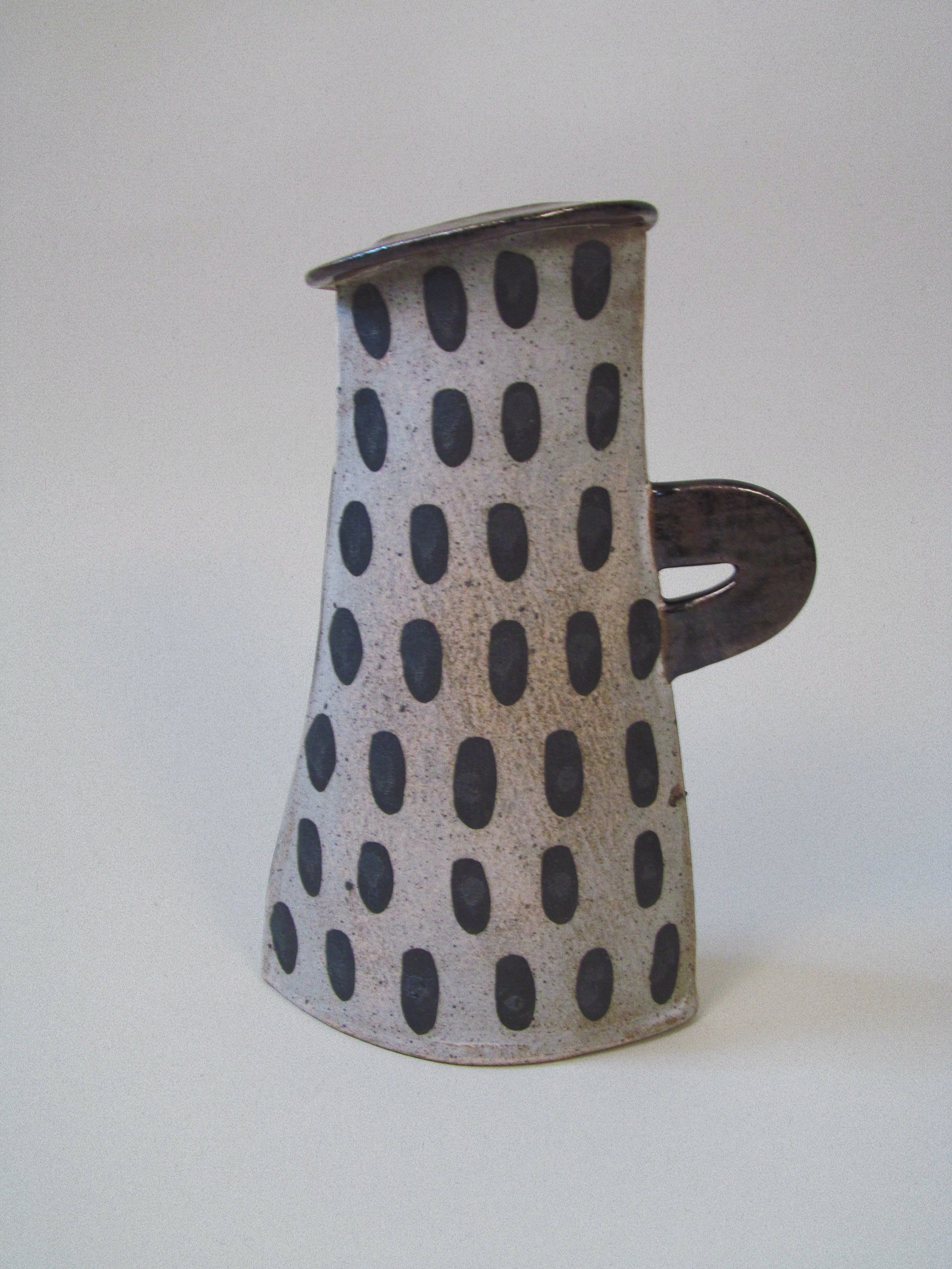 Kazuko Matthews Vases — side view of ceramic vase with black dots