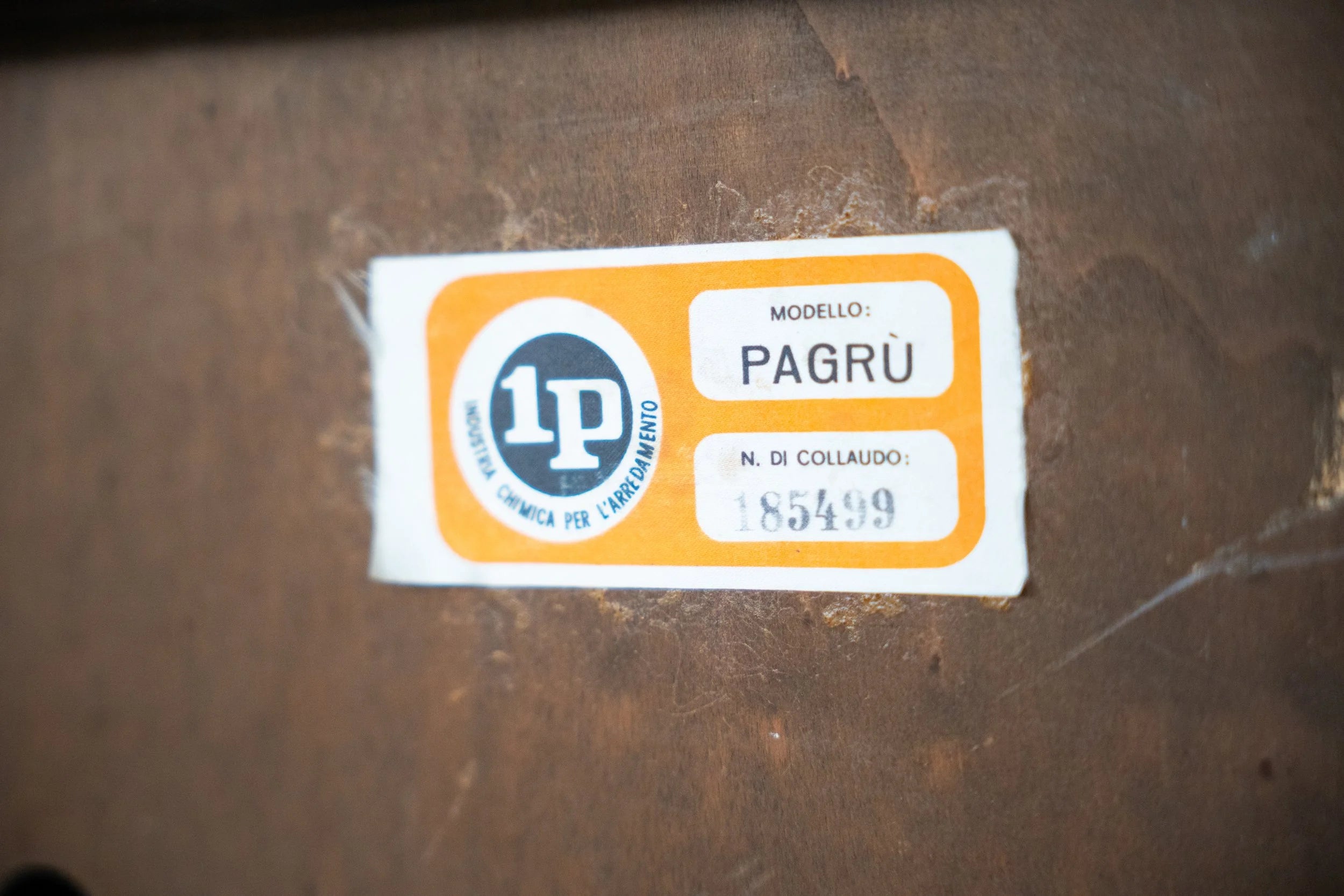 Pagru Lounge Chair by Claudio Vagnoni for 1P — close-up of product label on wood