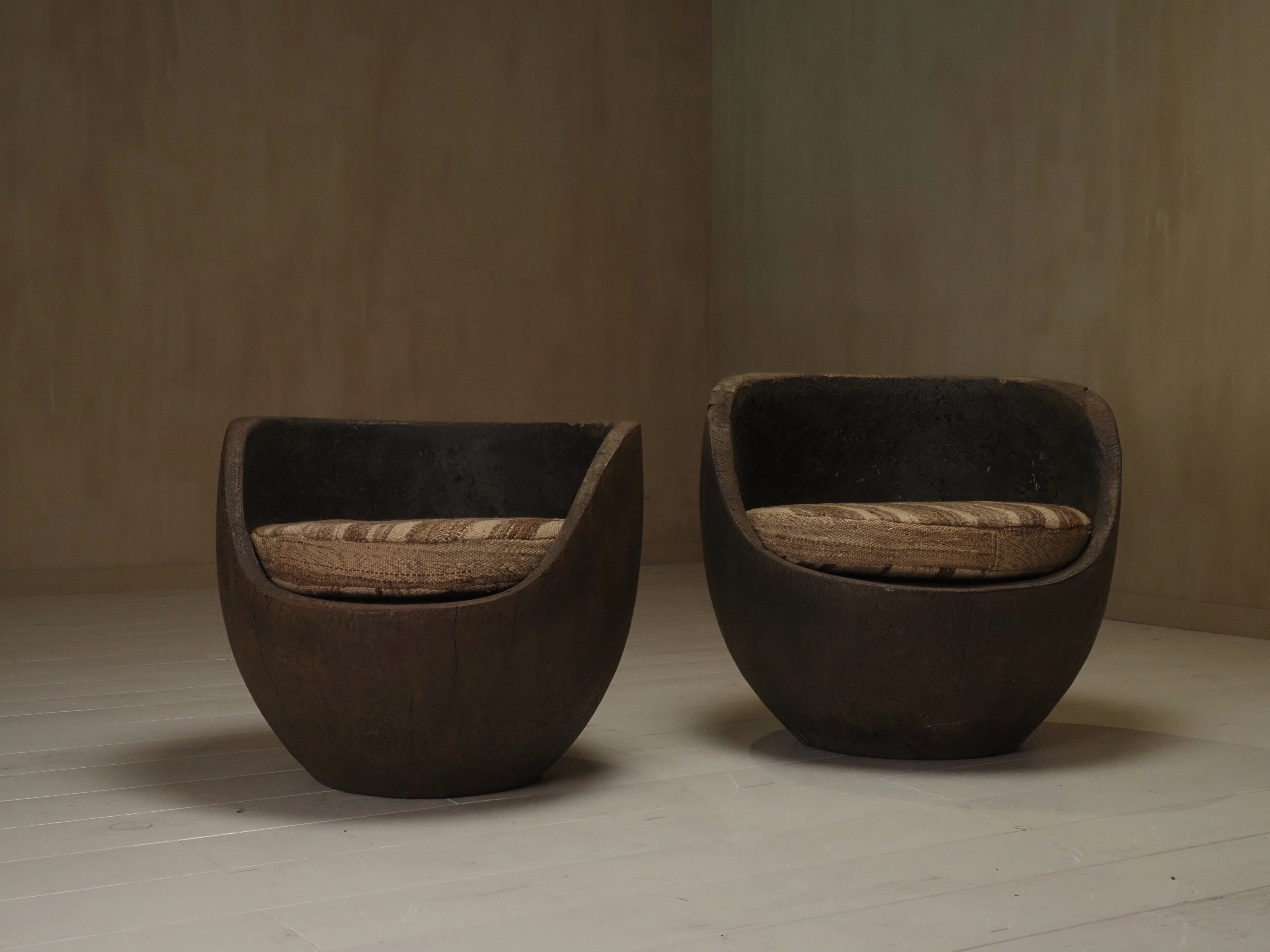 Sculptural mid-century hand-carved pair lounge chairs by Puttenaers | The Oblist