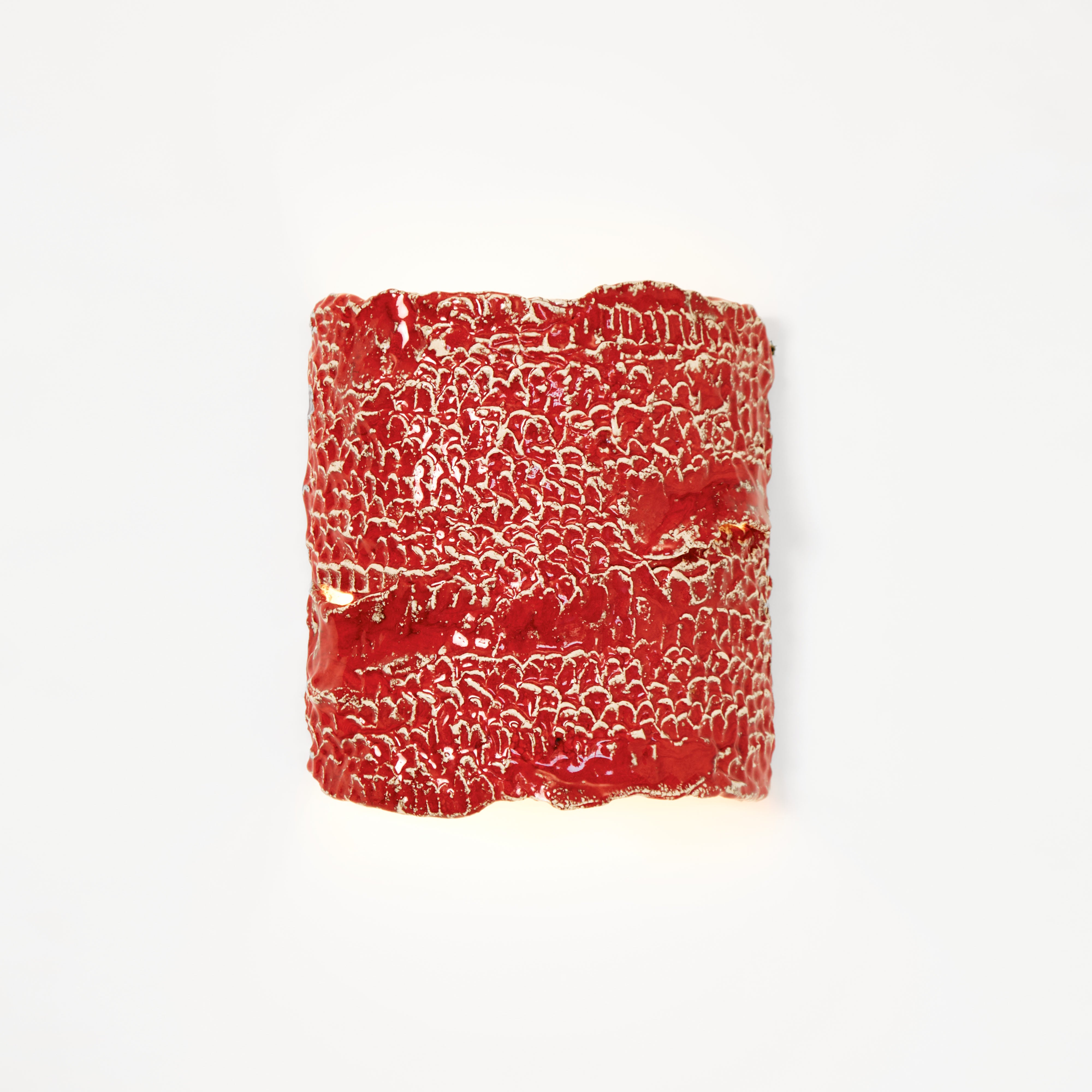 Casa Wall Light No3 — textured red ceramic wall light on white background