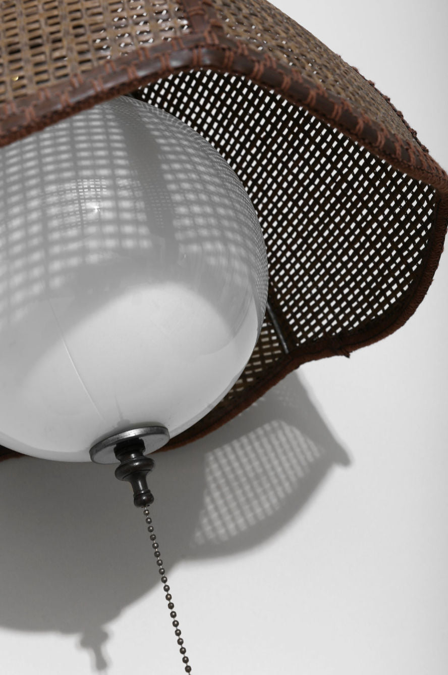 Rattan Swag Pendant Lamp, Plug-in — close-up of woven rattan shade