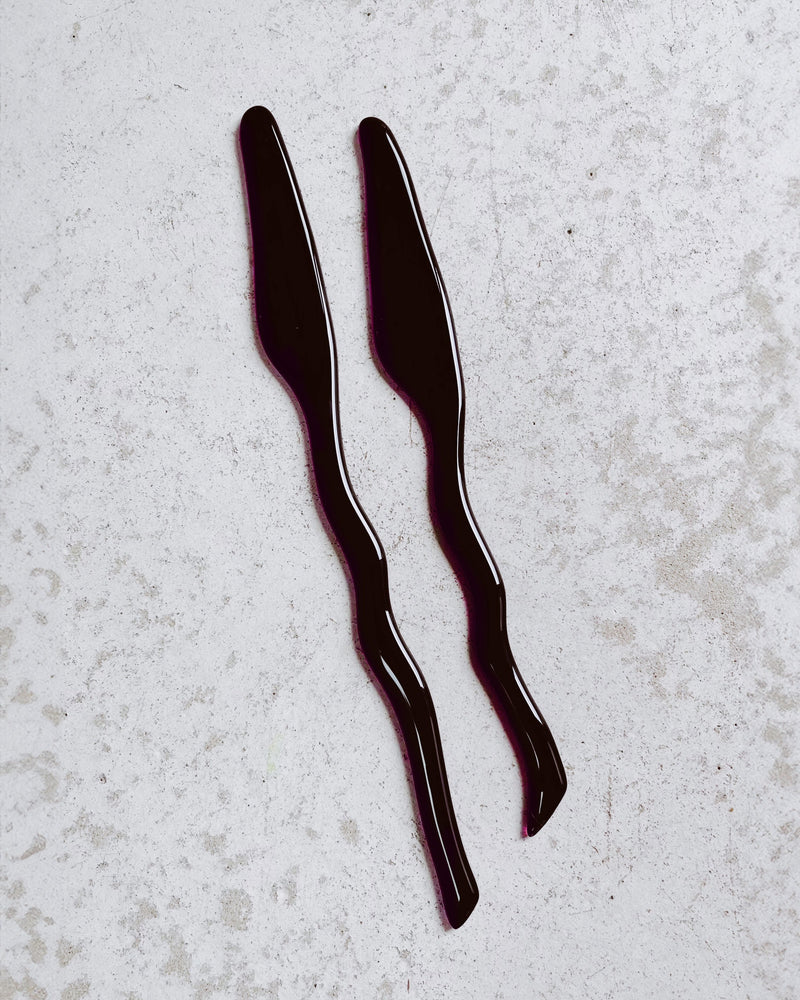 Memphis butter knives set in glossy burgundy finish by Alexandra Denat