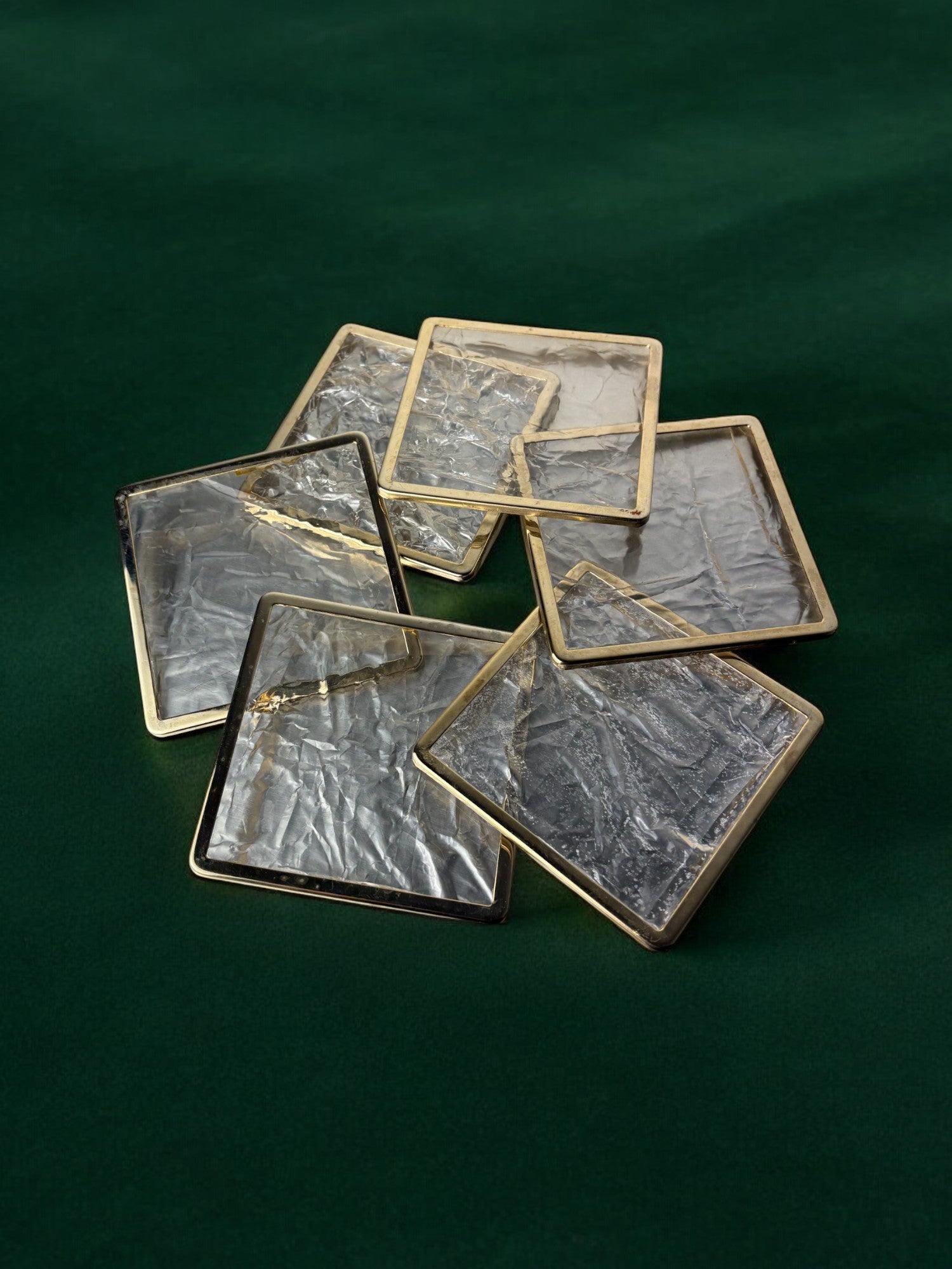 Ice Effect Lucite Coasters, Set of 6, Italy, circa 1970s — arranged on dark green surface