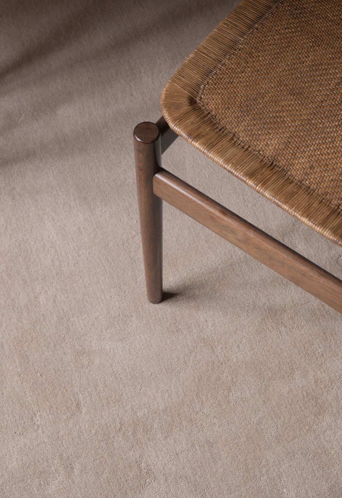 'Solid Wool' Handwoven Rug, Oatmeal — side angle