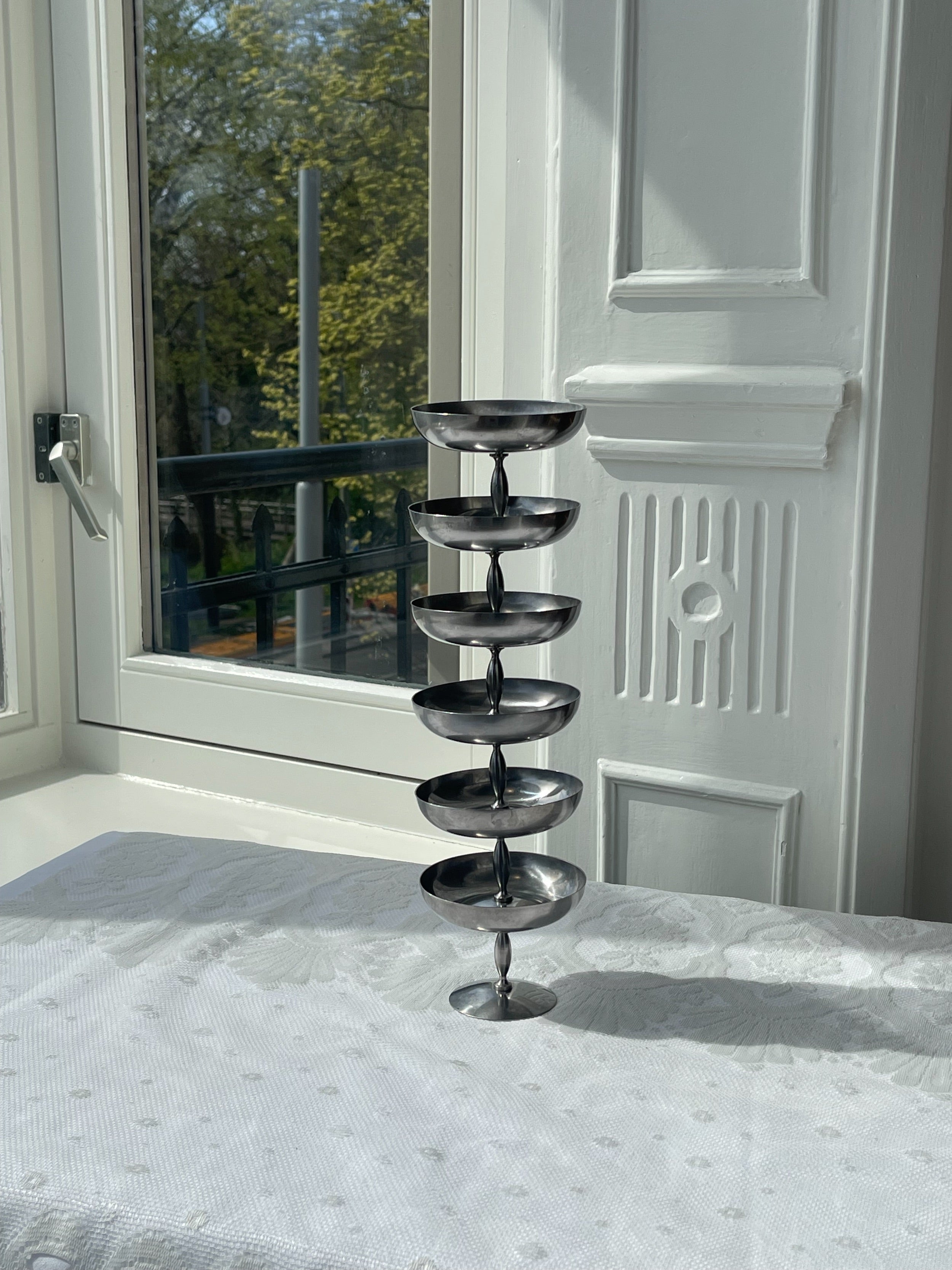 Stainless Steel Pedestal Coupes — side angle