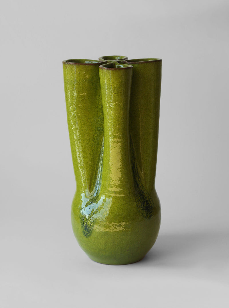 Green ceramic vase with glossy glaze and four cylindrical necks