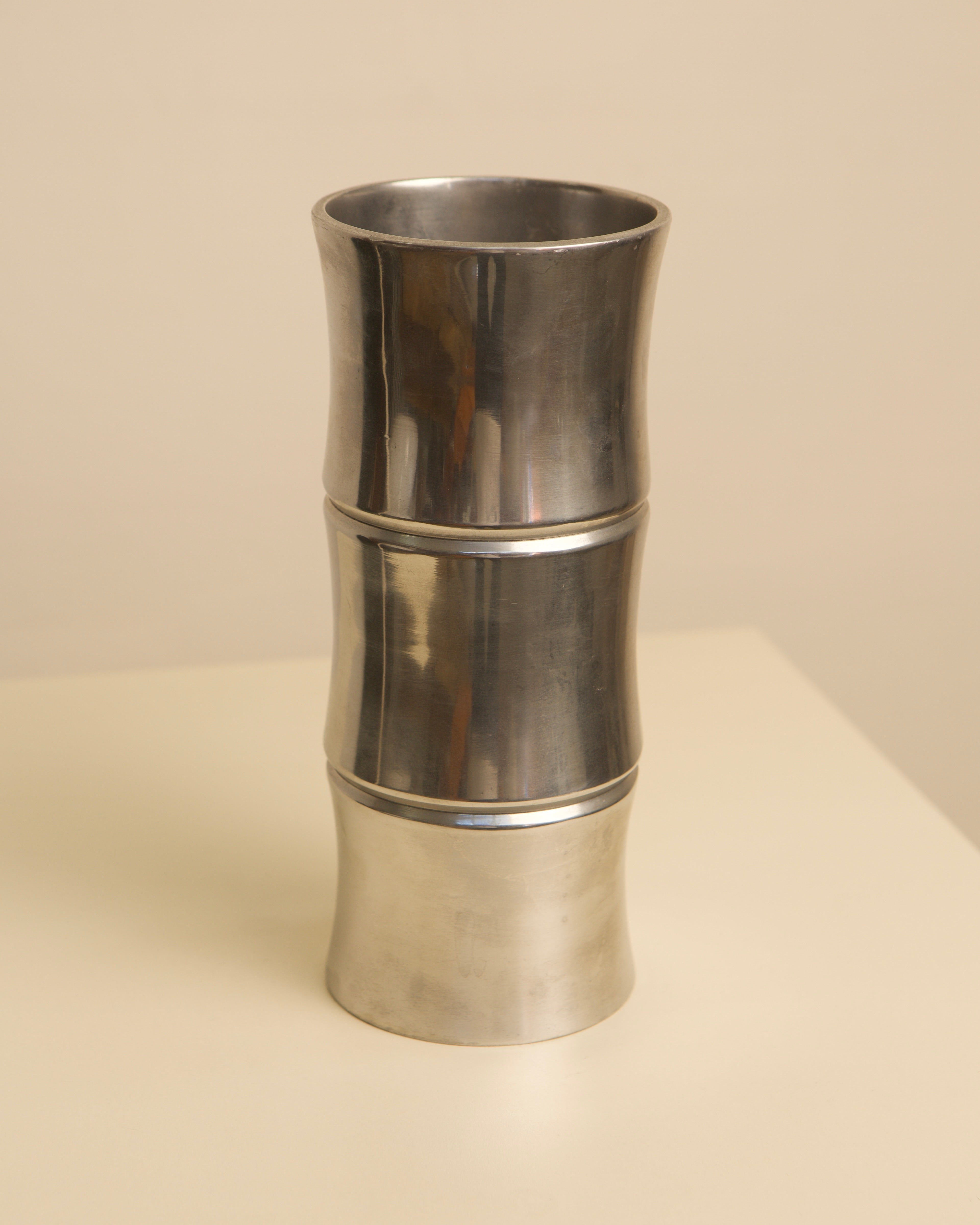 Cast aluminum vase with segmented cylindrical design, 1980s vintage