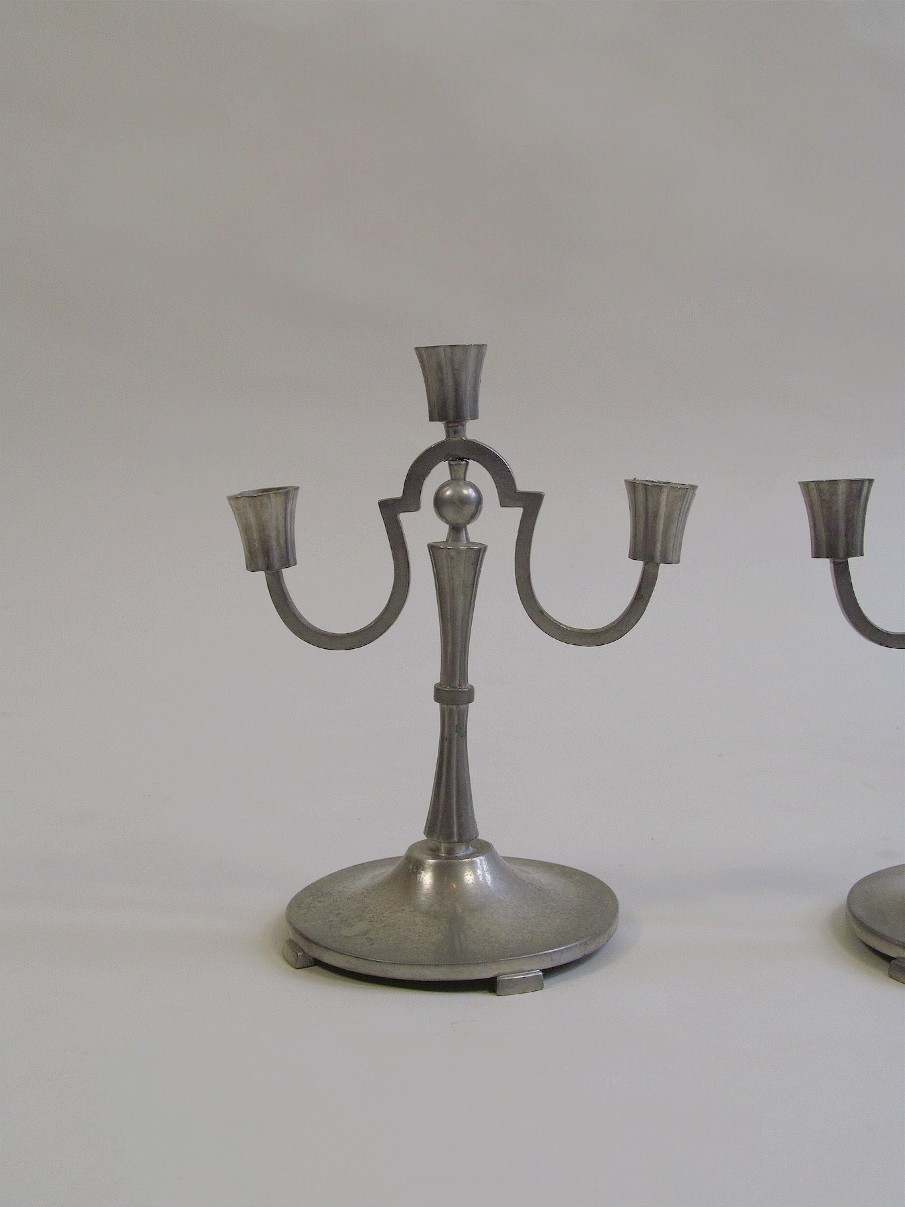 Swedish Grace Candlesticks — close-up of brushed metal finish