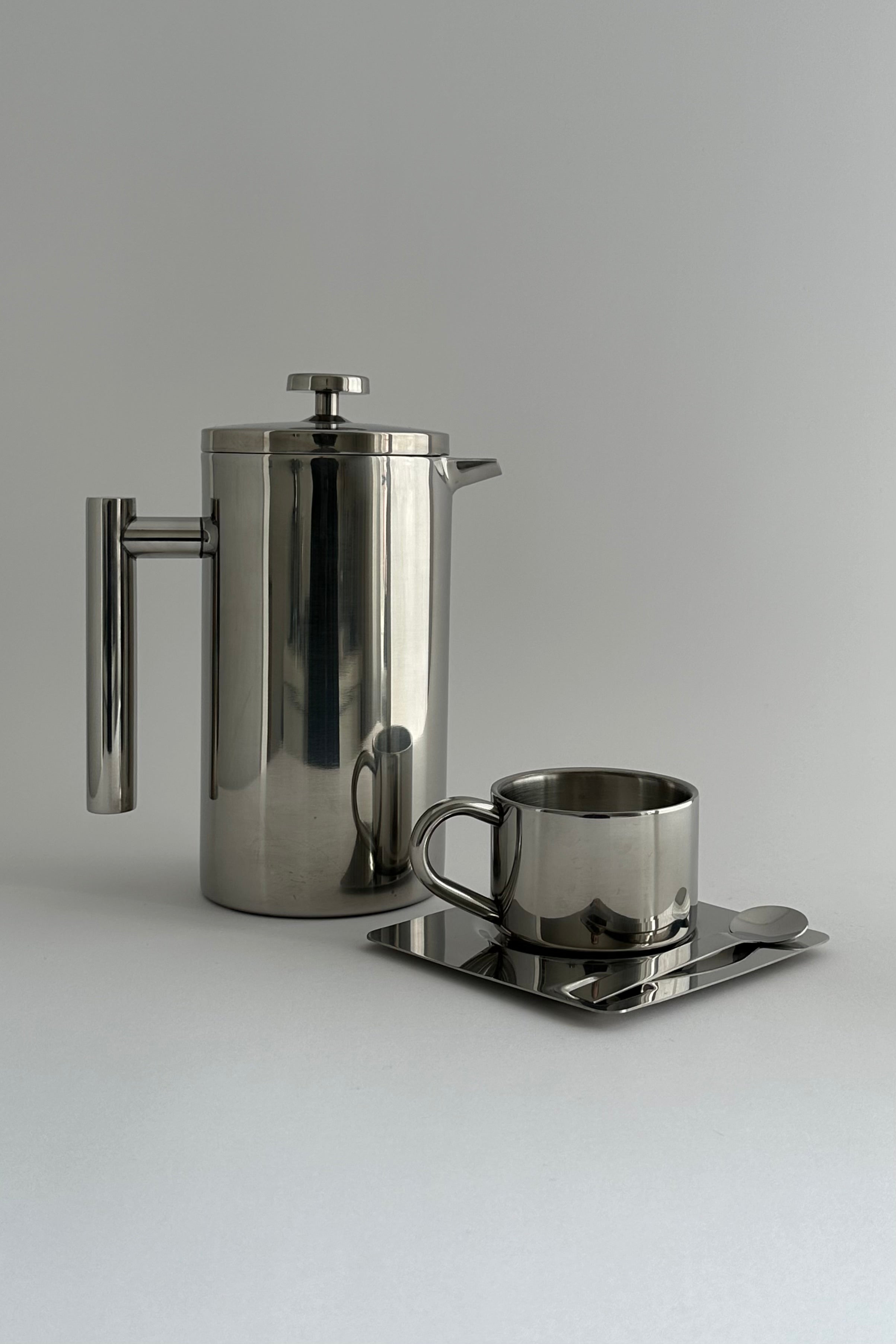 'HEDONISM' stainless steel french press — in context