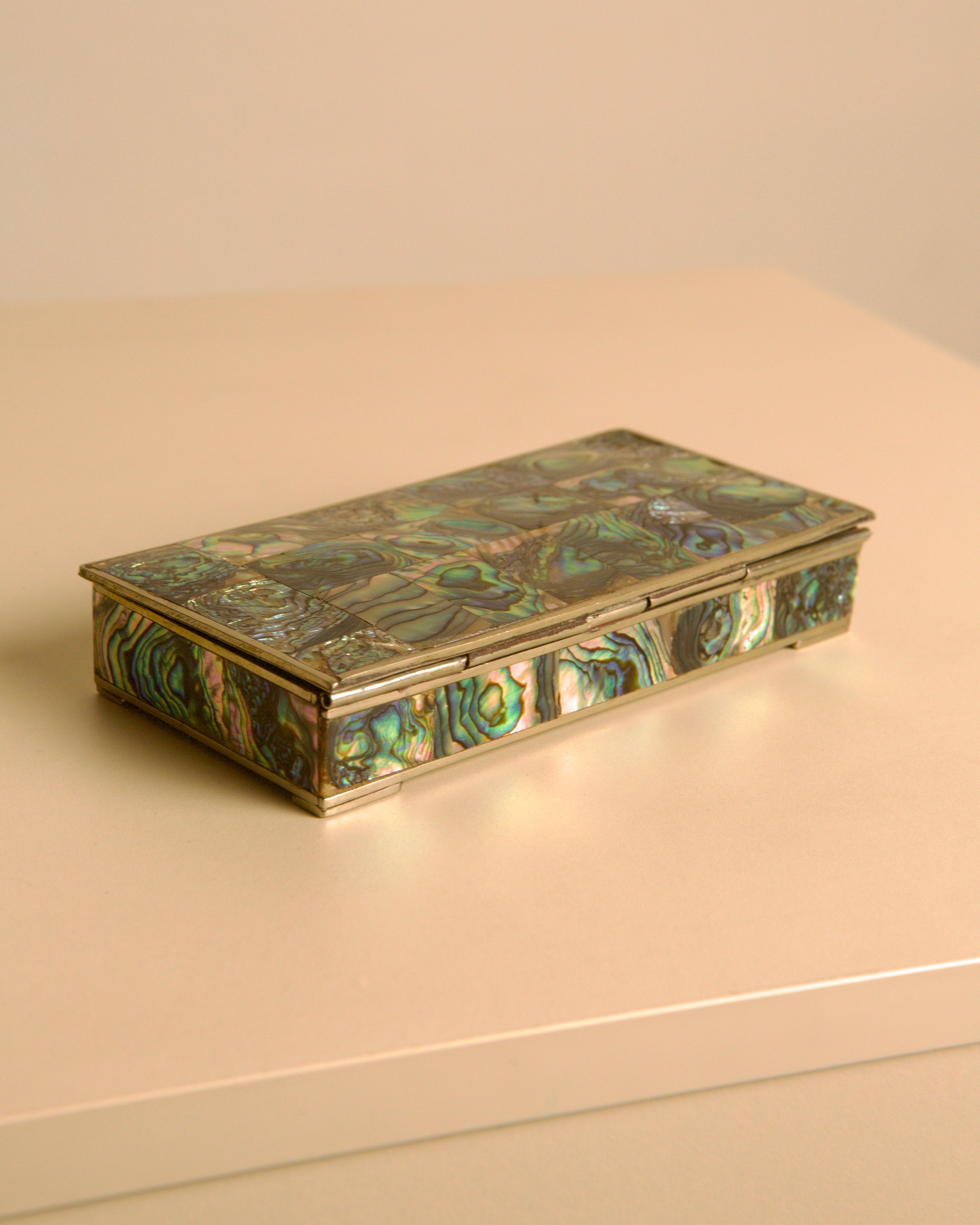 Italian Rectangular Silver and Mother-of-pearl Inlaid Box 40s — angled view highlighting iridescent mother-of-pearl detail