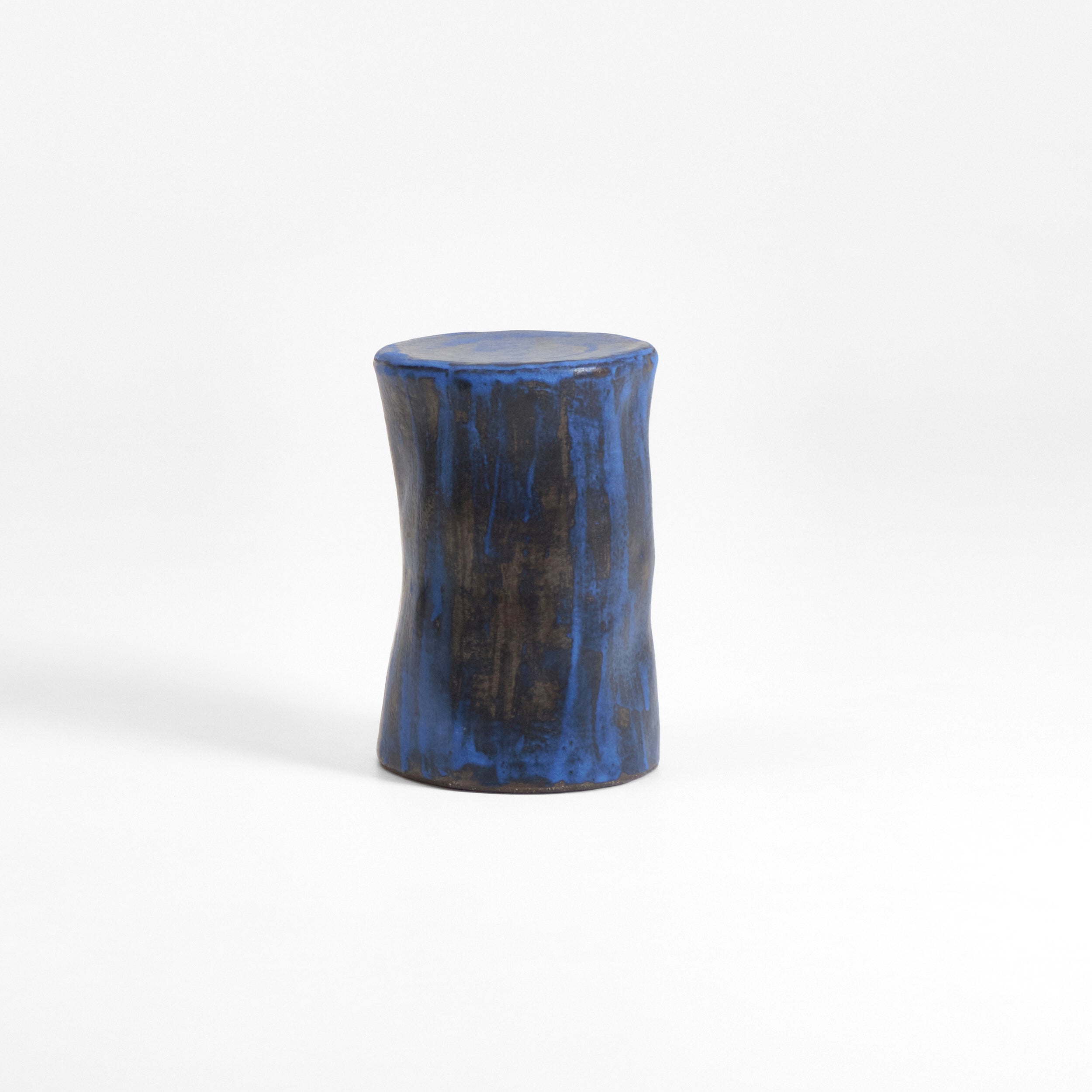 Small Ceramic Side Table — side angle showing blue textured surface