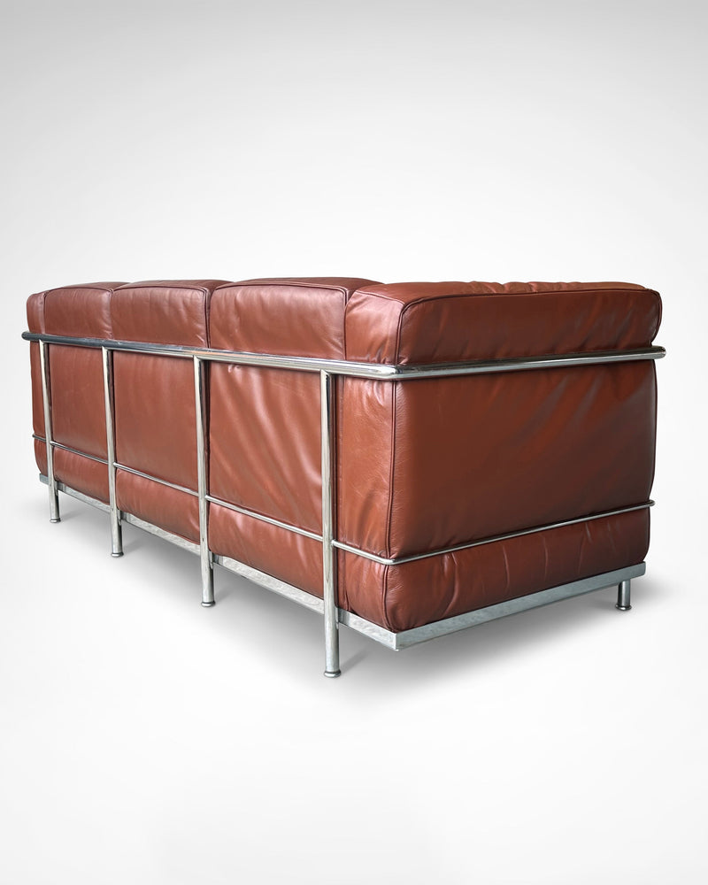 Early production LC2 leather 3-seater sofa by Le Corbusier et al Cassina 1970s — rear view highlighting brown leather and chr
