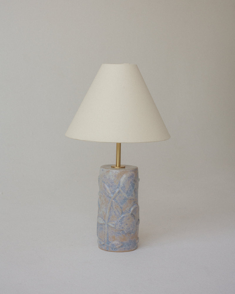 Folklore table lamp with textured ceramic base and cream shade in misty lavender