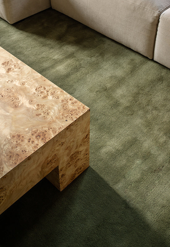 'Solid Wool' Handwoven Rug, Capulet Olive — side angle