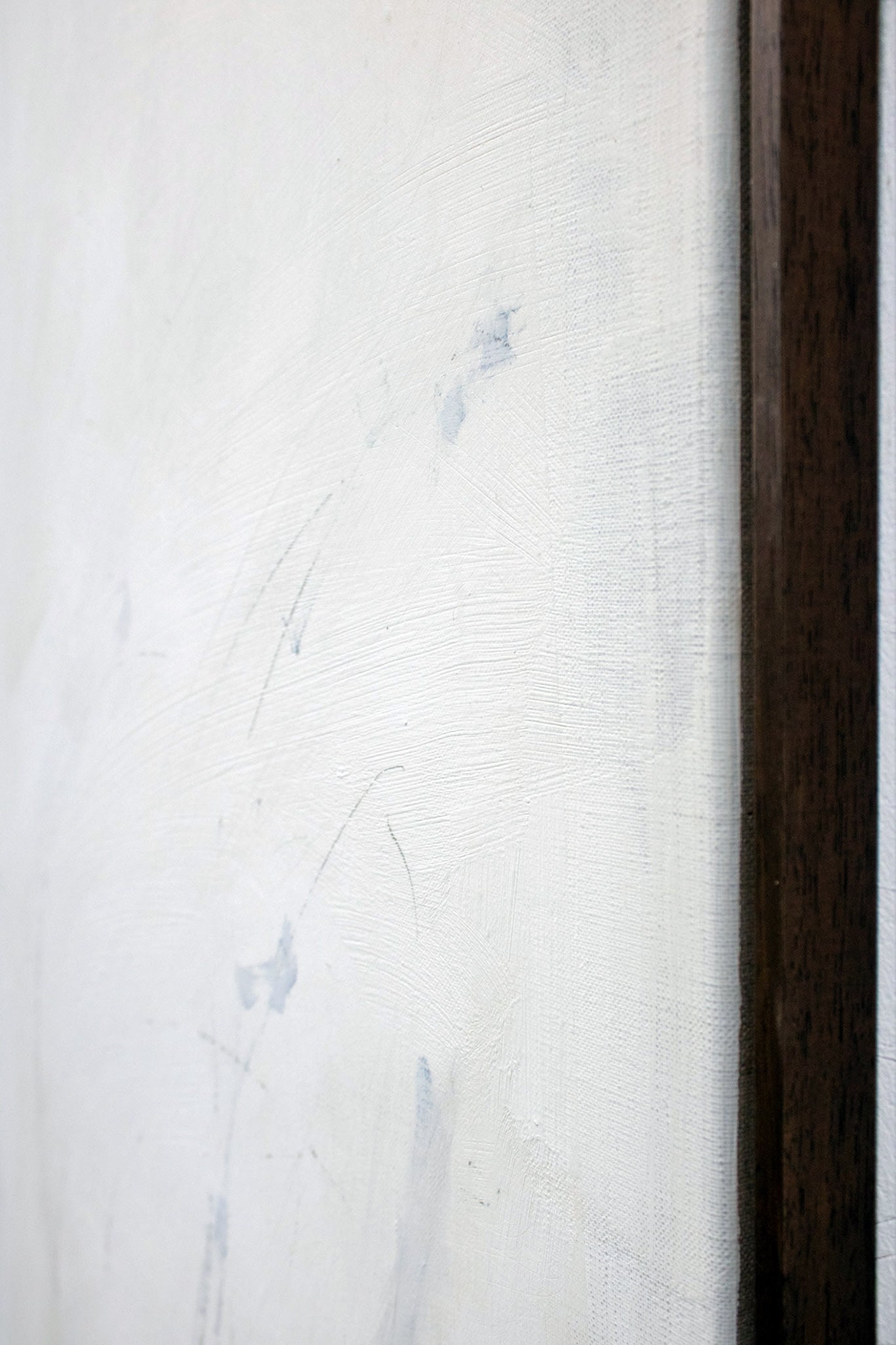 White textured linen canvas detail with subtle brushwork texture