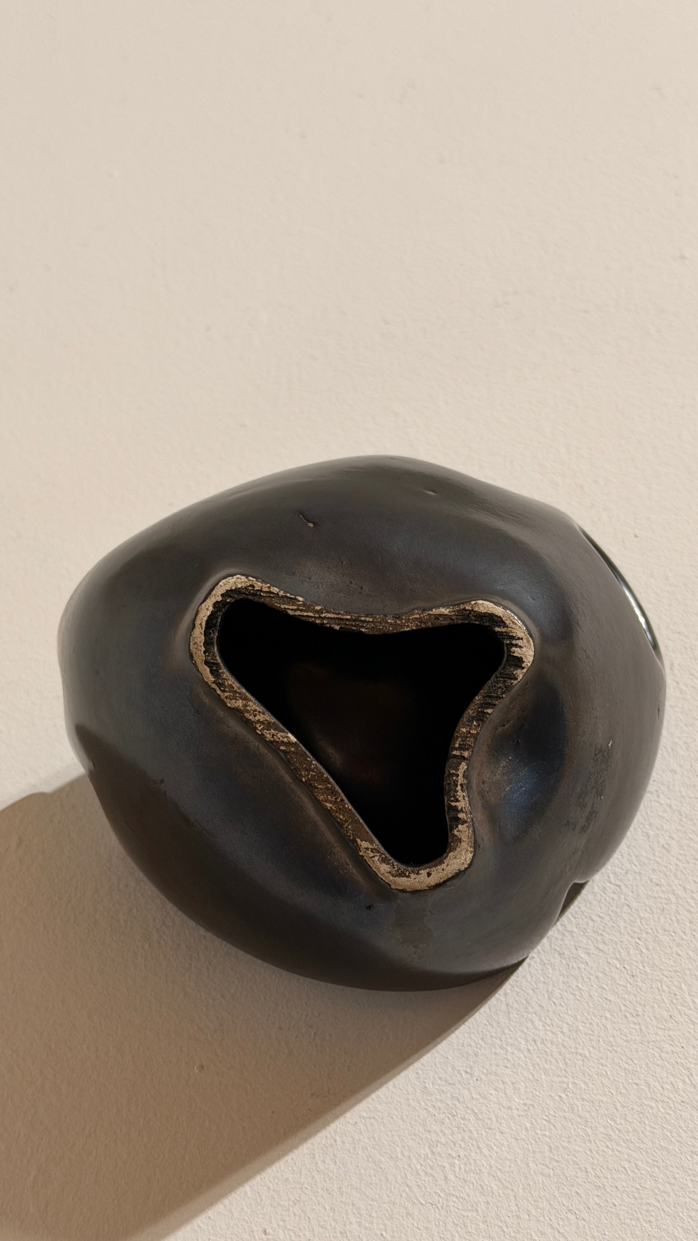 Free-form Ceramic Bowl, Vallauris, France, circa 1960 — back view highlighting dark ceramic finish