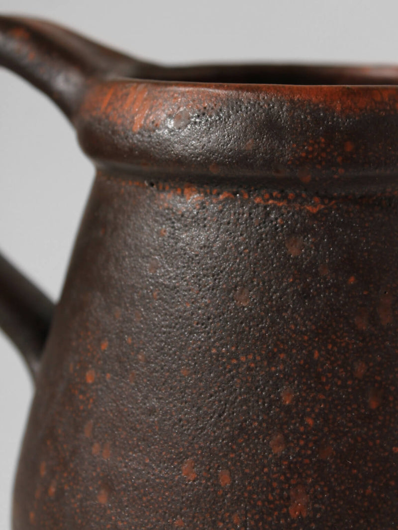 Hartwig Heyne Dark Brown Rustic Jug 1L — close-up of textured dark brown ceramic surface
