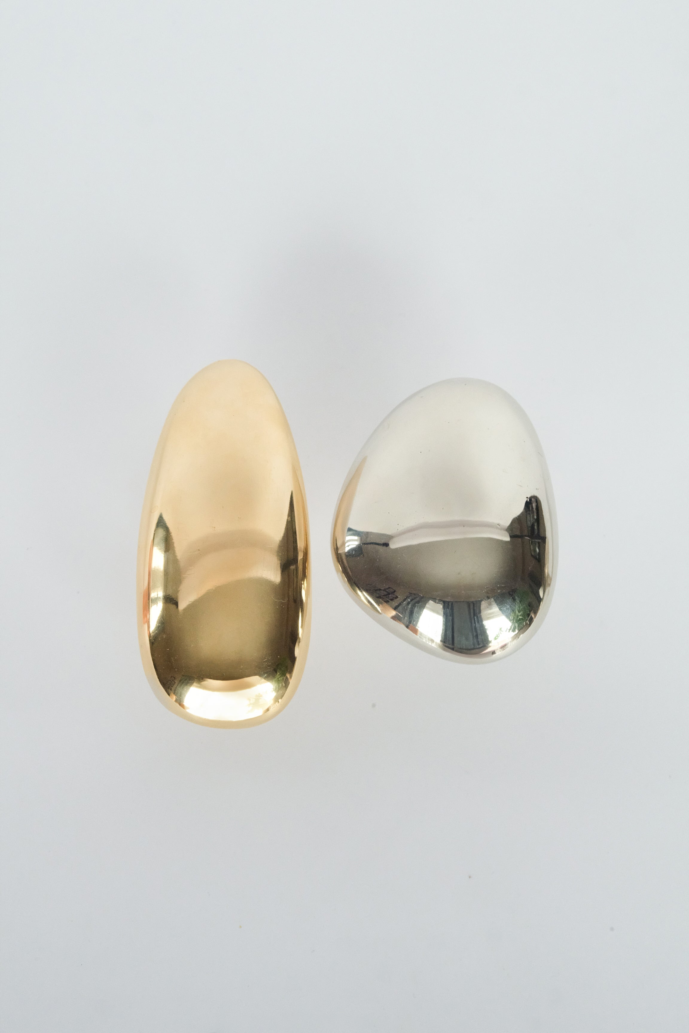 MOMI Cabinet Knob/Wall Hook Short — top view of brass and chrome finishes