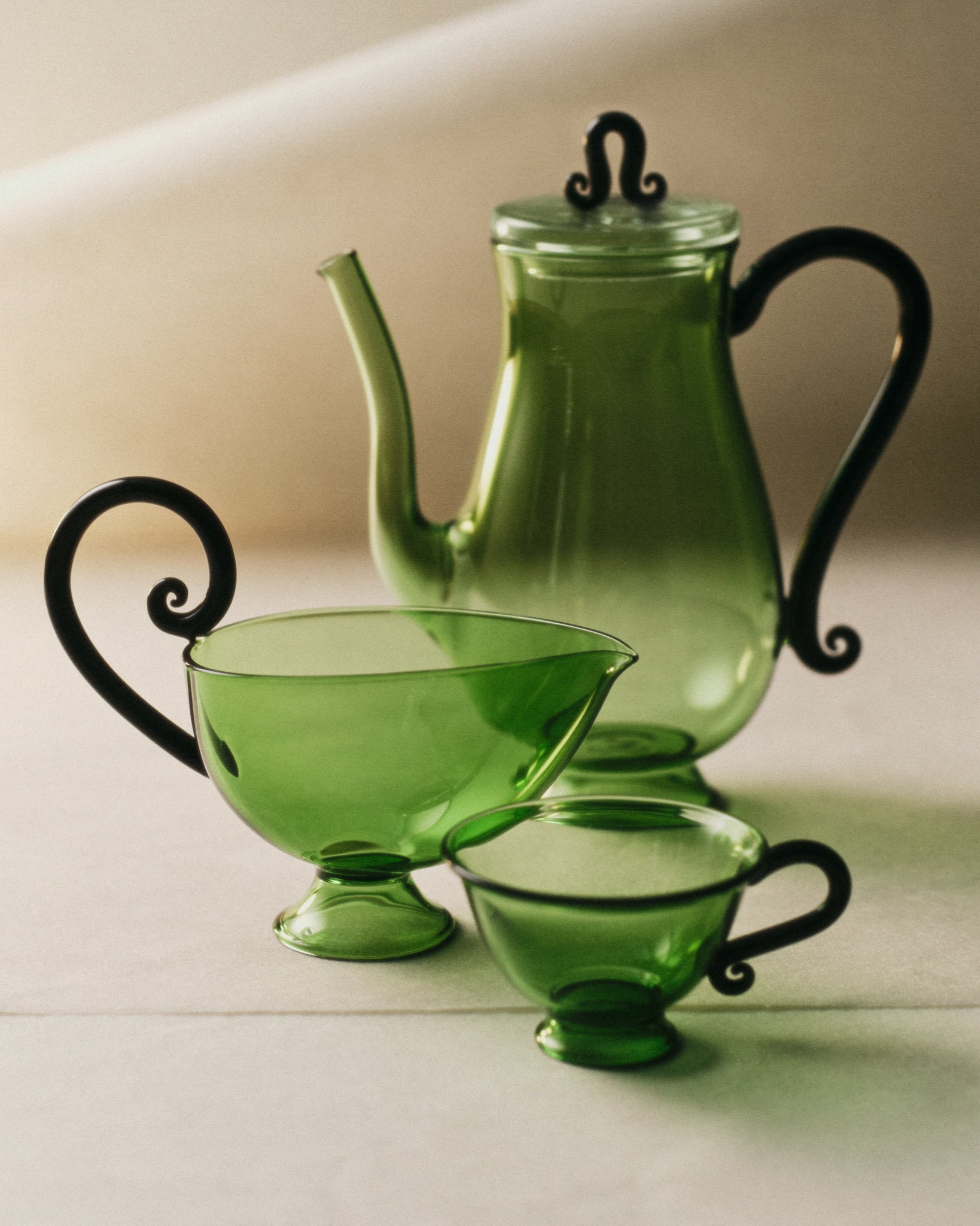 Bell Pot — top view of green glass teapot and cups