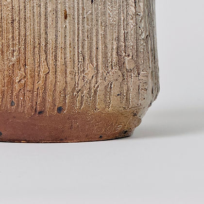 Stoneware Vase by Gustave Tiffoche — close-up of textured gray surface