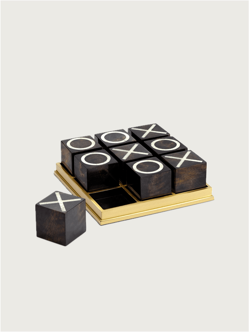 Deco Tic Tac Toe — close-up of black and gold game pieces