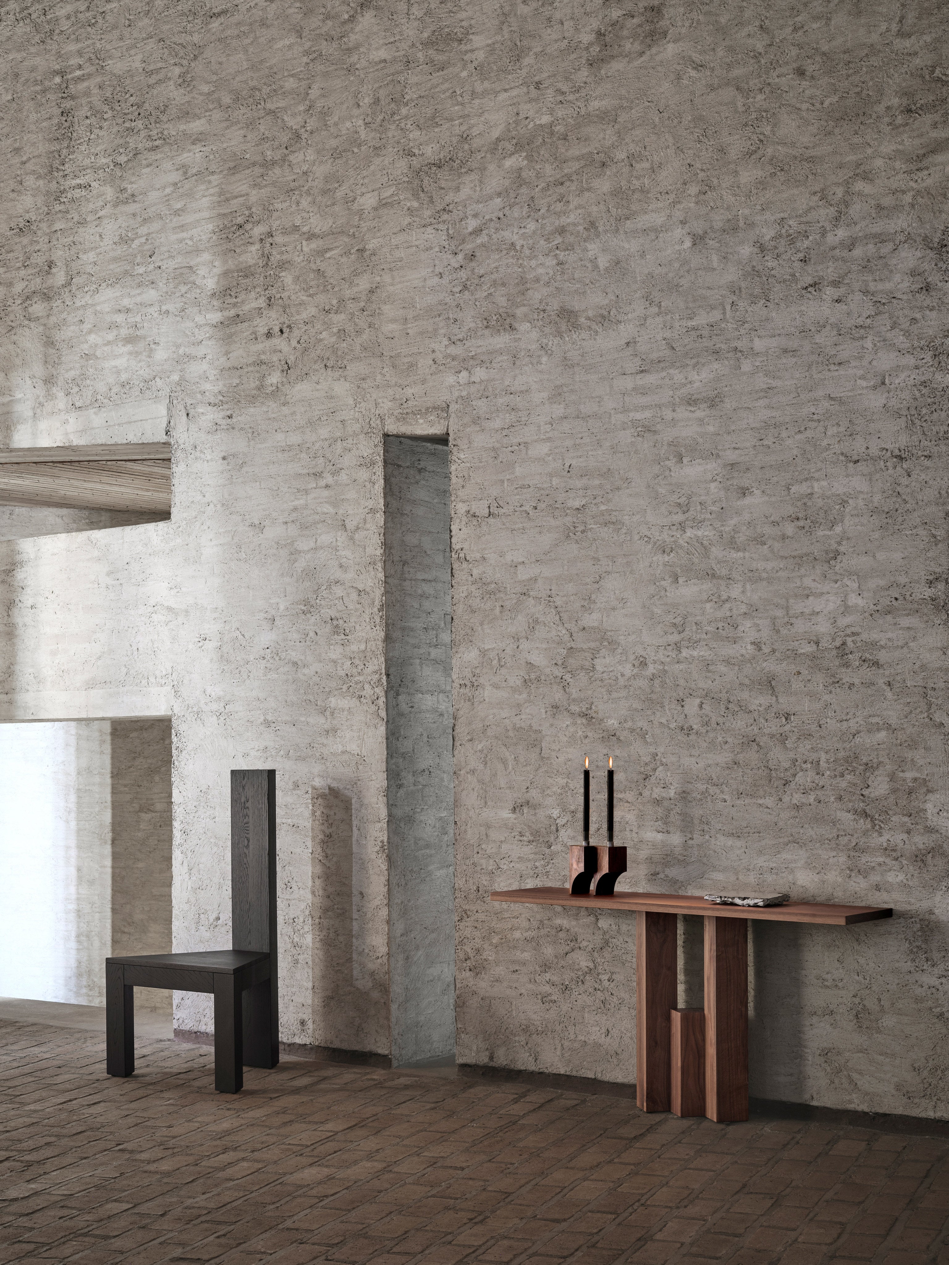 Fenestra Console — back view against textured stone wall