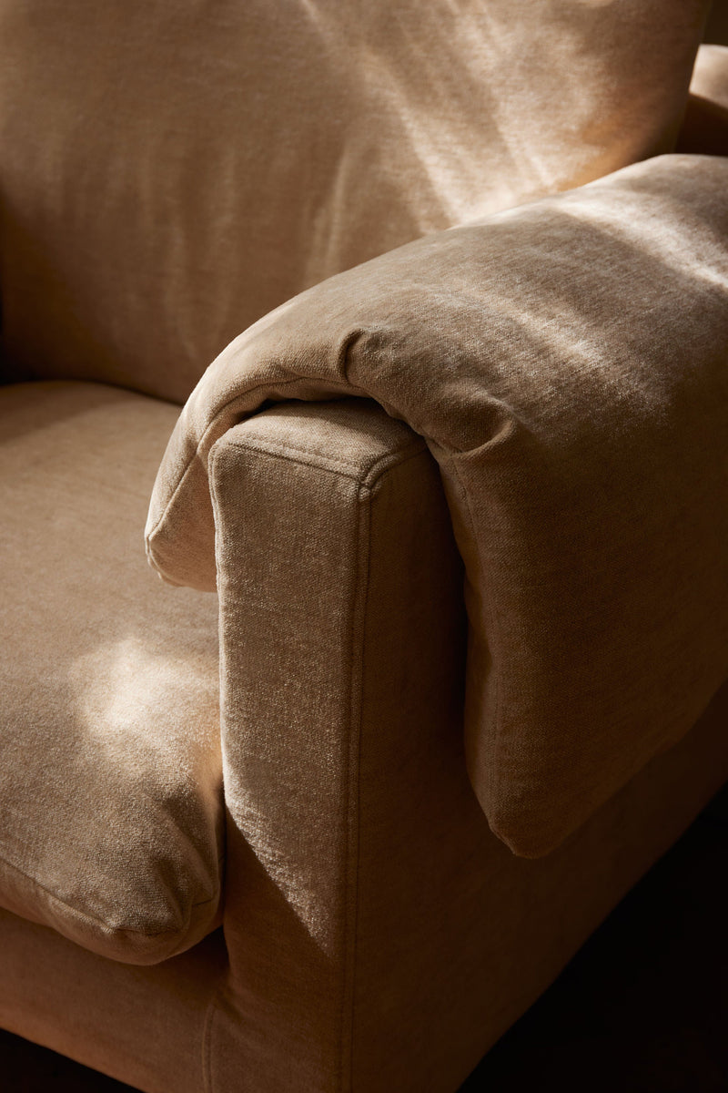 La Plume' Sofa in Dedar Belsuede Fabric — close-up of armrest detail in warm beige